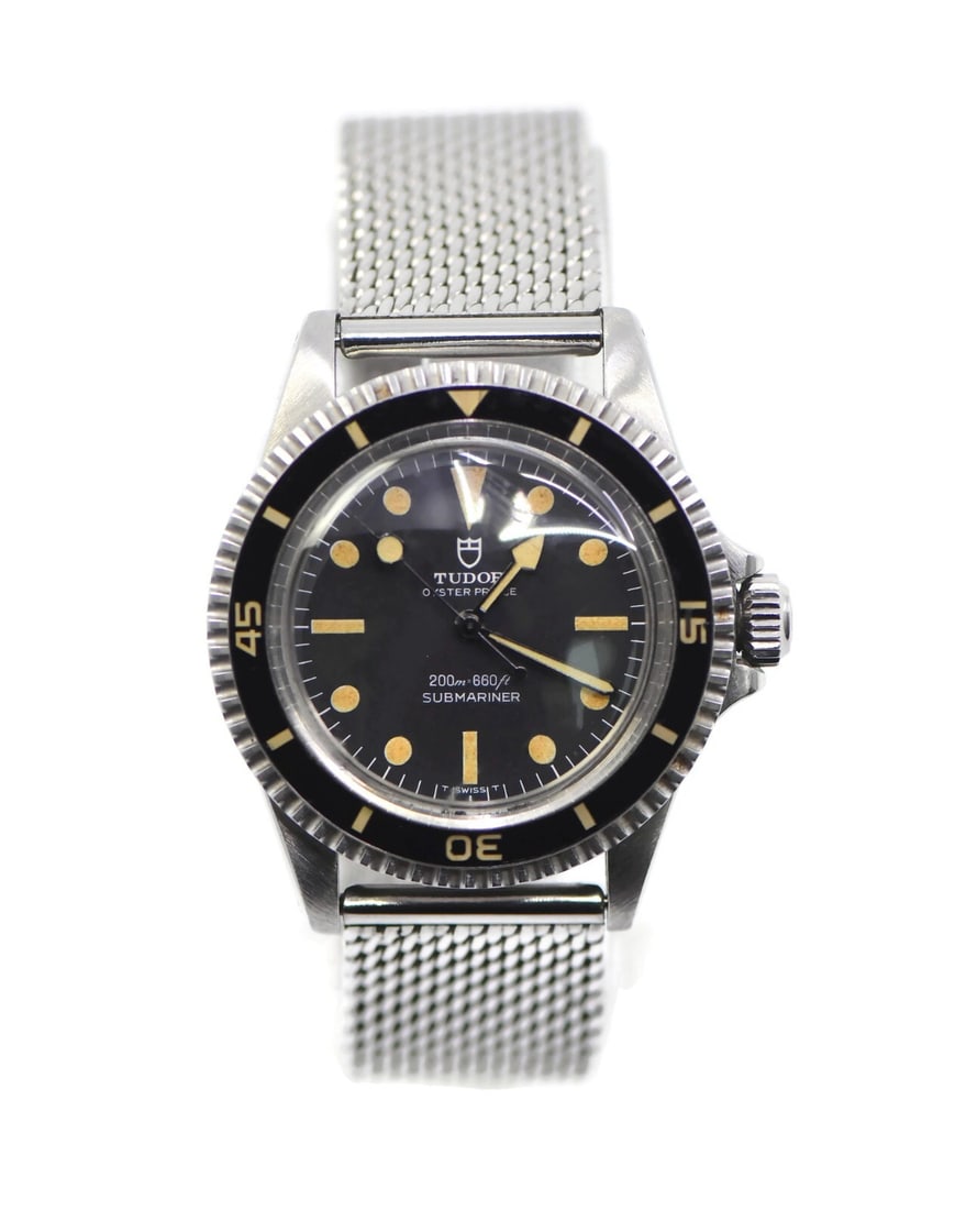 TUDOR Submariner Stainless Steel Watch 7928 Authentic 40mm: TUDOR Submariner Stainless Steel Watch 7928 Authentic 40mm The Tudor Submariner Stainless Steel Watch 7928 is a classic wristwatch that combines functionality with timeless style. This pre-owned timep