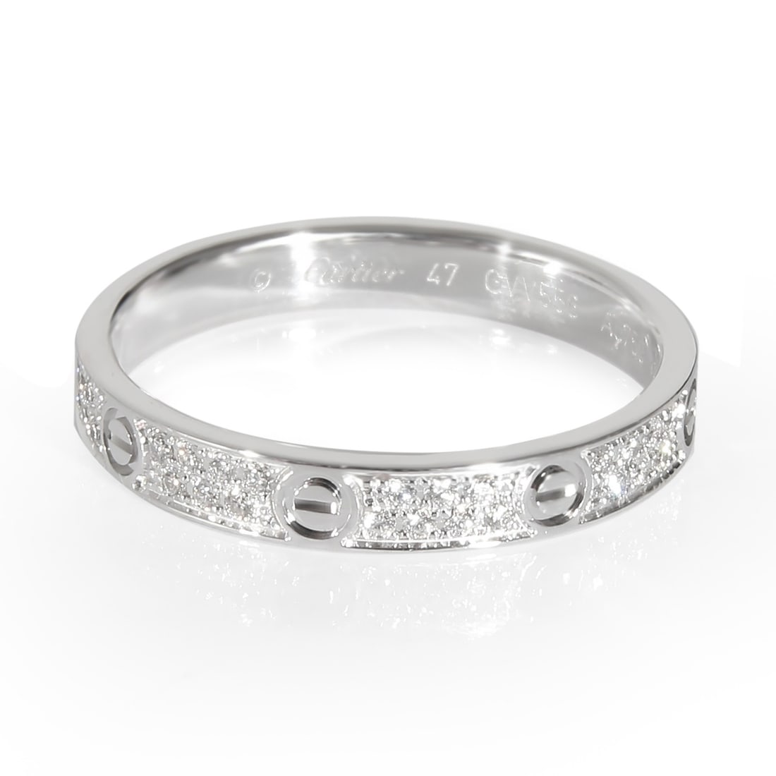 Cartier Mini Model Love Ring 18k White Gold Diamond VVS1: Cartier Mini Model Love Ring 18k White Gold Diamond VVS1 This exquisite Cartier Mini Model Love Ring is a stunning piece crafted from 18 karat white gold. It features a round brilliant diamond, weighi