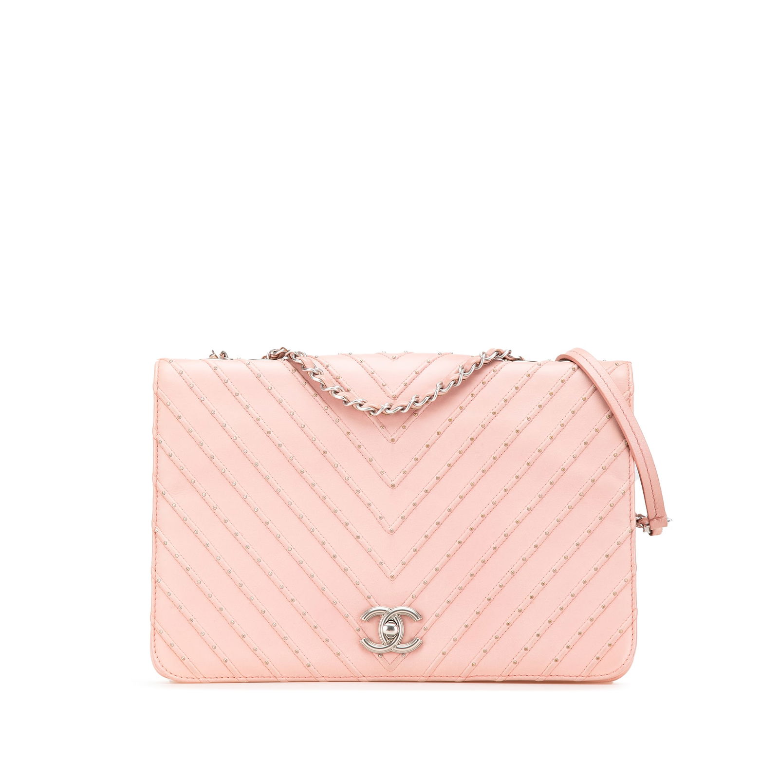 Chanel Pink Chevron Calfskin Studded Full Flap Bag: Chanel Pink Chevron Calfskin Studded Full Flap Bag This stylish Chanel Chevron Calfskin Studded Full Flap bag showcases a luxurious studded leather body in an elegant pink hue. It features a distincti