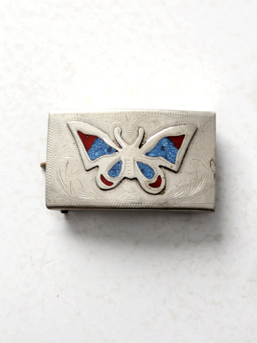 Southwestern Vintage Turquoise Inlay Butterfly Belt Buckle: Southwestern Vintage Turquoise Inlay Butterfly Belt Buckle This vintage turquoise belt buckle showcases a stunning southwestern style with a silver tone finish. It features a beautifully raised butter