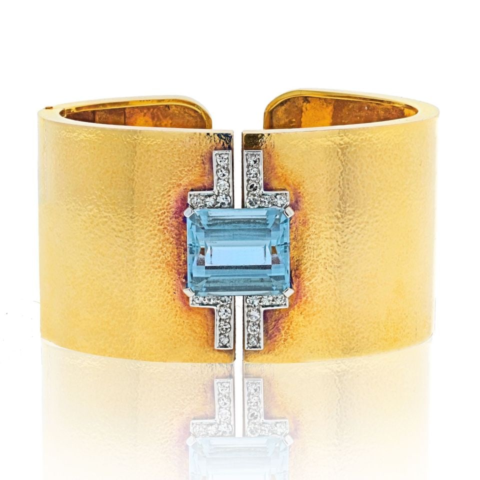 David Webb Platinum 18K Gold Aquamarine Diamond Hinged Cuff Bracelet: David Webb Platinum 18K Gold Aquamarine Diamond Hinged Cuff Bracelet Introducing the exquisite David Webb Platinum & 18K Yellow Gold Aquamarine and Diamond Hinged Cuff Bracelet, a true embodiment of e