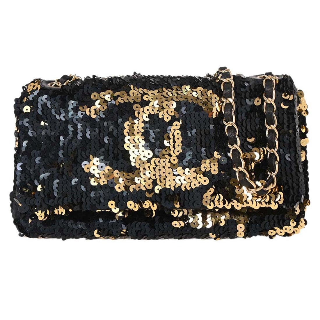 Navy Sequin Medium Shoulder Bag by Chanel with Chain Strap: Navy Sequin Medium Shoulder Bag by Chanel with Chain Strap This Chanel navy shoulder bag features a sequin exterior with a leather lining. The bag is designed with a medium size, magnetic closure, and