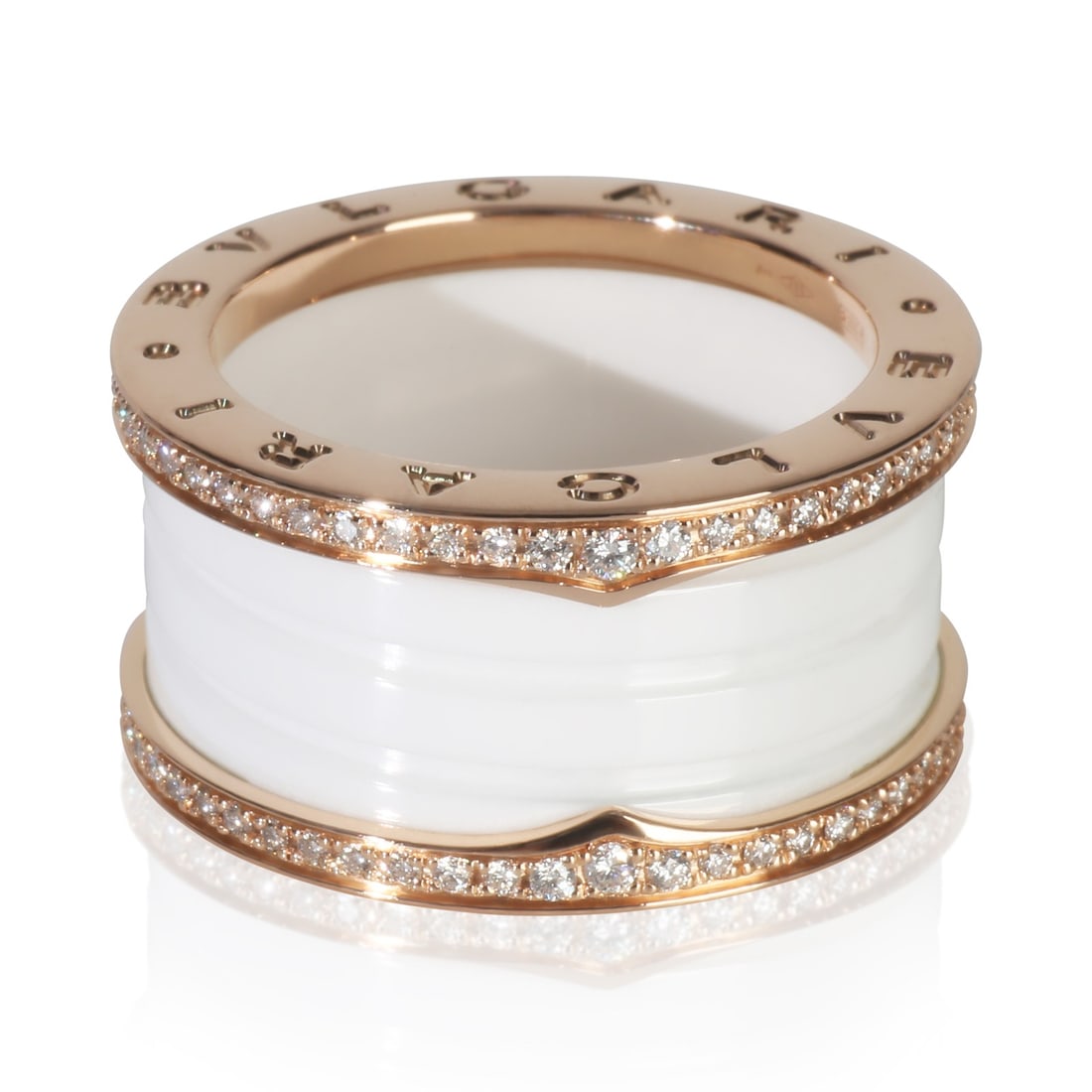 B.zero1 18k Rose Gold Diamond Women's Ring Size 8.25: B.zero1 18k Rose Gold Diamond Women's Ring Size 8.25 This BVLGARI B.zero1 ring is crafted from 18k rose gold and features round brilliant cut diamonds with a total carat weight of 0.50. The main stone