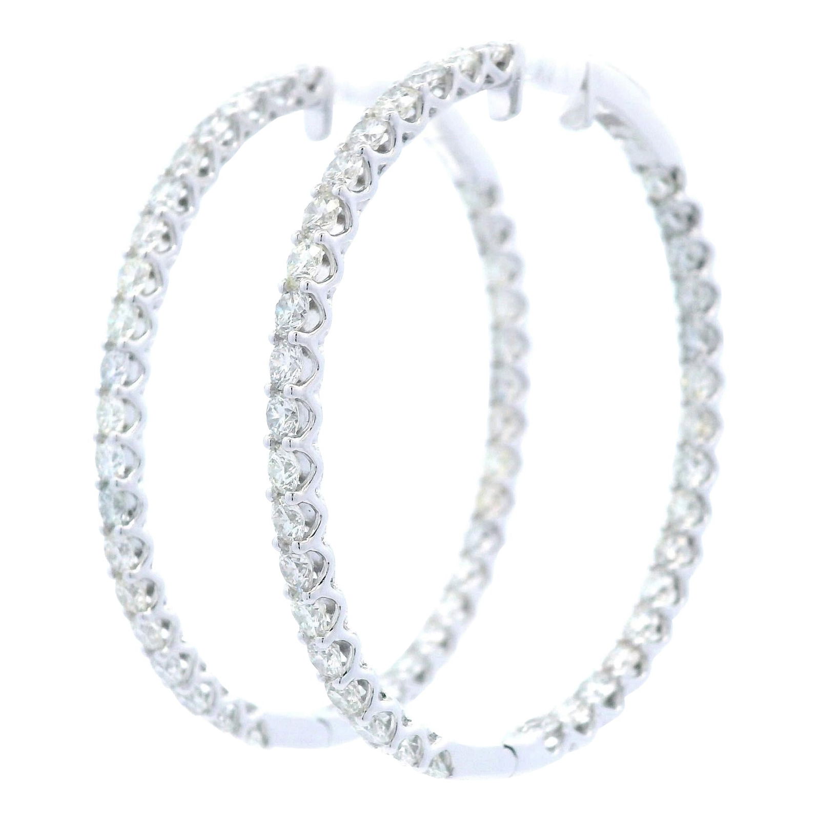 14k White Gold 6.13ct Round Diamond Hoop Earrings with Appraisal: 14k White Gold 6.13ct Round Diamond Hoop Earrings with Appraisal Elevate your elegance with these stunning round diamond hoop earrings, expertly crafted in 14k white gold. Featuring a total of 72 roun