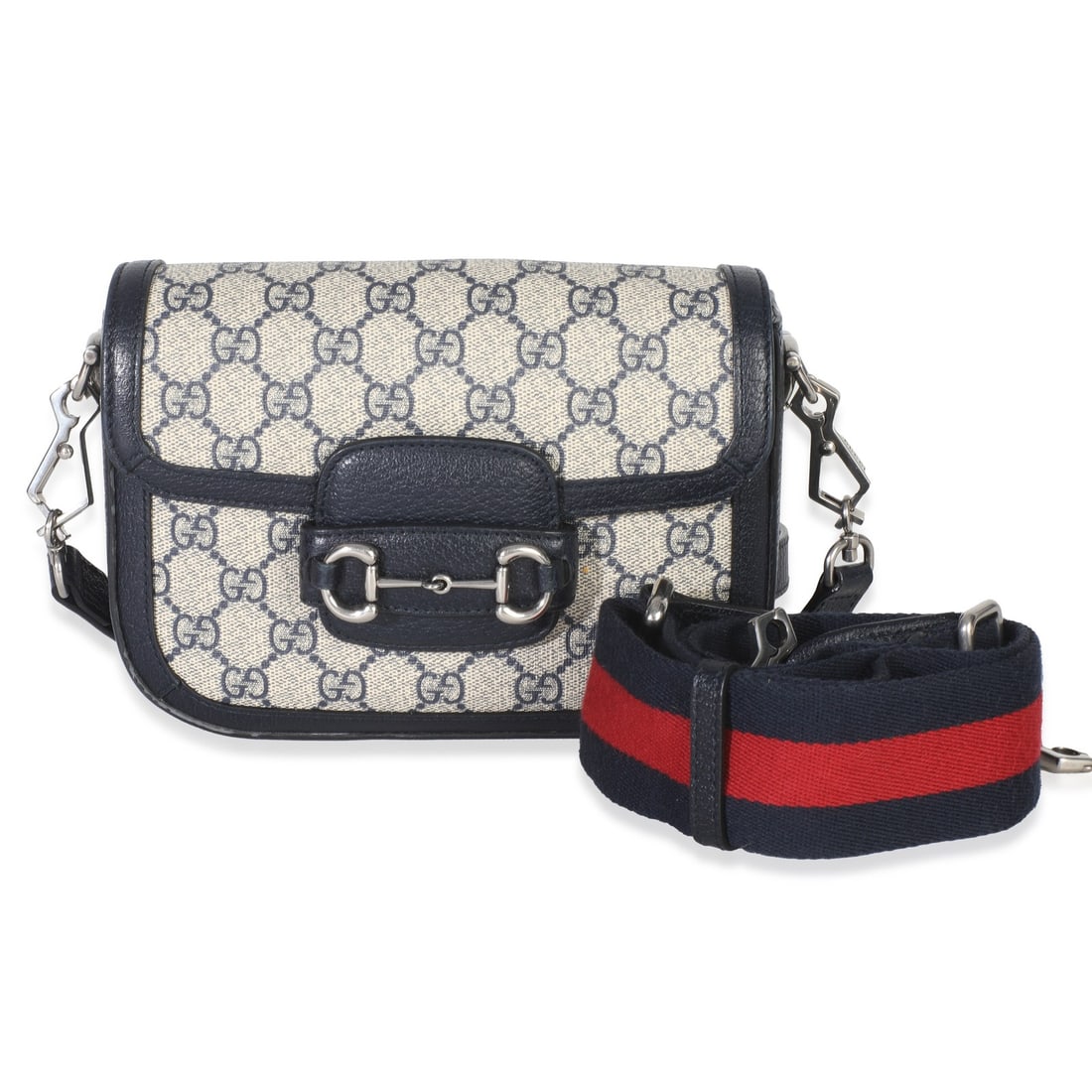 Horsebit 1955 Mini Shoulder Bag in Navy GG Supreme Canvas with Silver-Tone Hardware: Horsebit 1955 Mini Shoulder Bag in Navy GG Supreme Canvas with Silver-Tone Hardware This Gucci Horsebit 1955 Mini Bag features the signature GG Supreme monogram canvas in beige and blue with silver-to