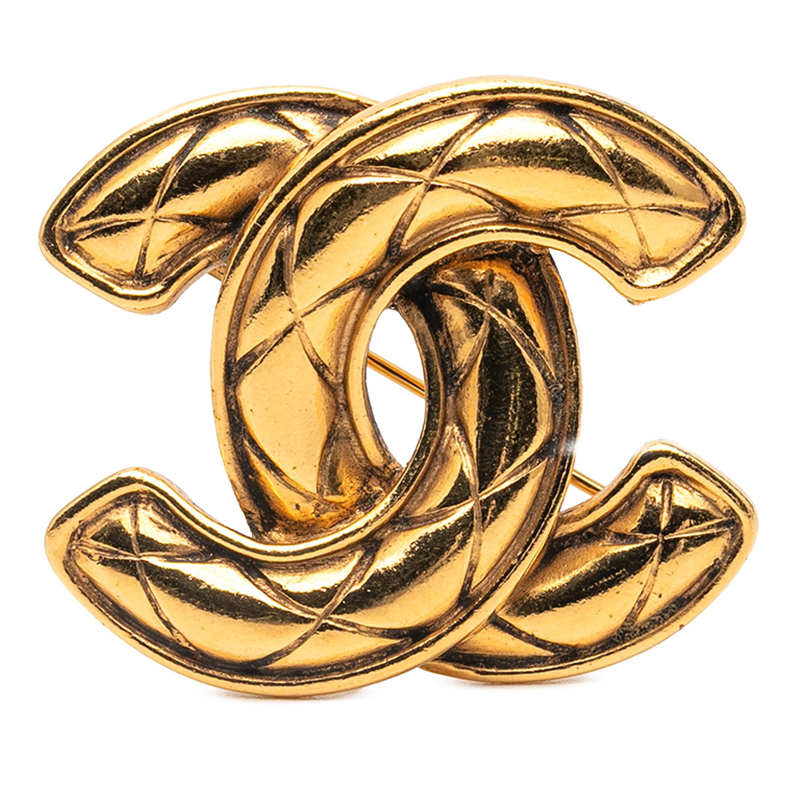 Chanel Gold Plated CC Quilted Costume Brooch France: Chanel Gold Plated CC Quilted Costume Brooch France This exquisite Chanel Gold Plated CC Quilted Brooch showcases a stunning gold-tone metal body that captures the essence of luxury. Designed with a c