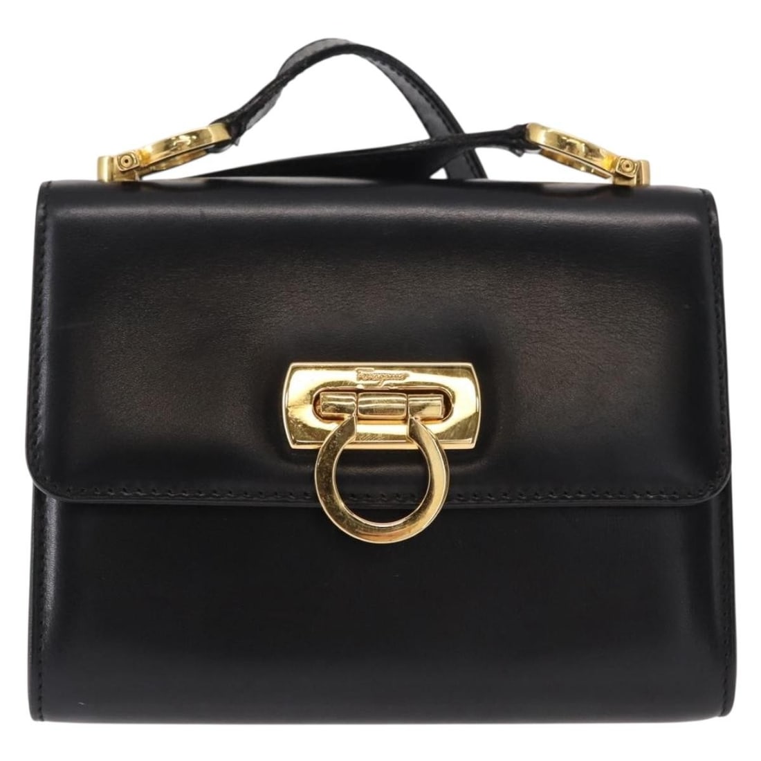 Gancini Black Shoulder Bag by Salvatore Ferragamo: Gancini Black Shoulder Bag by Salvatore Ferragamo This pre-owned Salvatore Ferragamo Gancini shoulder bag in black is designed for women. It features visible signs of previous use, including rubbing a