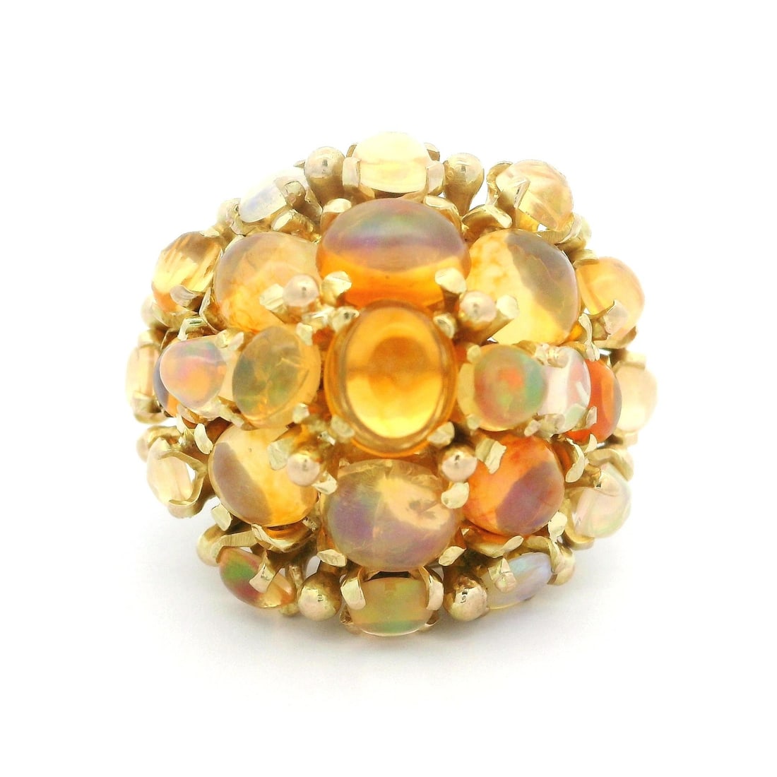 Vintage 14k Yellow Gold Fiery Orange Jelly Opal Cluster Ring: Vintage 14k Yellow Gold Fiery Orange Jelly Opal Cluster Ring This stunning vintage cocktail ring showcases a vibrant cluster of 25 natural genuine jelly opals in fiery hues of orange. The opals are ex