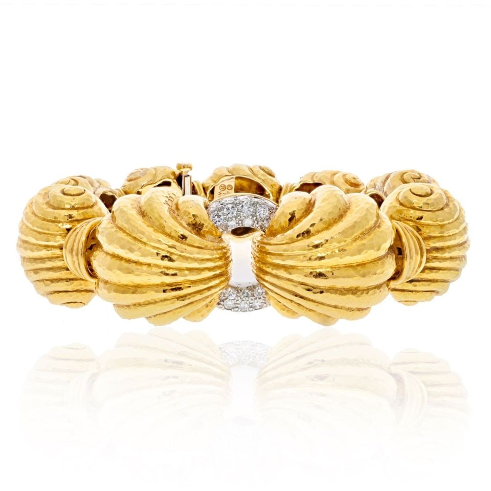 David Webb Escargot Fluted Bracelet in Platinum and 18K Yellow Gold: David Webb Escargot Fluted Bracelet in Platinum and 18K Yellow Gold This exquisite David Webb bracelet features a stunning combination of platinum and 18K yellow gold. Known for its innovative design,