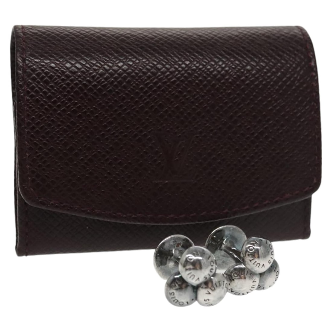 LOUIS VUITTON Taiga Cuff Case Acajou Leather Auth MI1001: LOUIS VUITTON Taiga Cuff Case Acajou Leather Auth MI1001 This authentic LOUIS VUITTON Taiga Cuffs Cuff Case is crafted from premium Taiga leather in a rich Acajou color. Designed for elegance and func