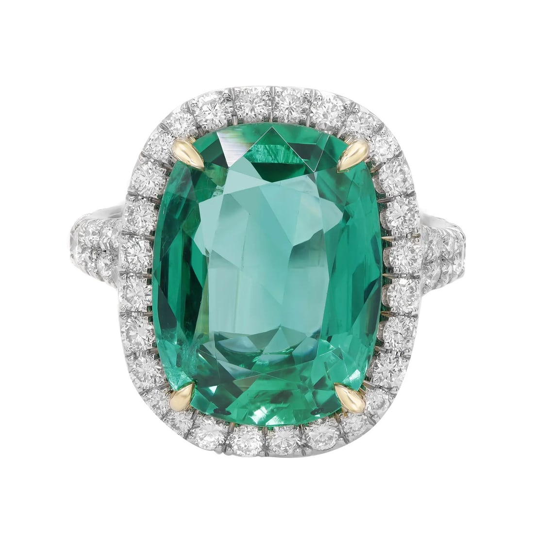 Rachel Koen 7.30Cts Zambian Emerald Diamond Halo Ring in Platinum: Rachel Koen 7.30Cts Zambian Emerald Diamond Halo Ring in Platinum This stunning cocktail ring features a GIA certified cushion-shaped Zambian emerald, weighing an impressive 7.30 carats, elegantly sur
