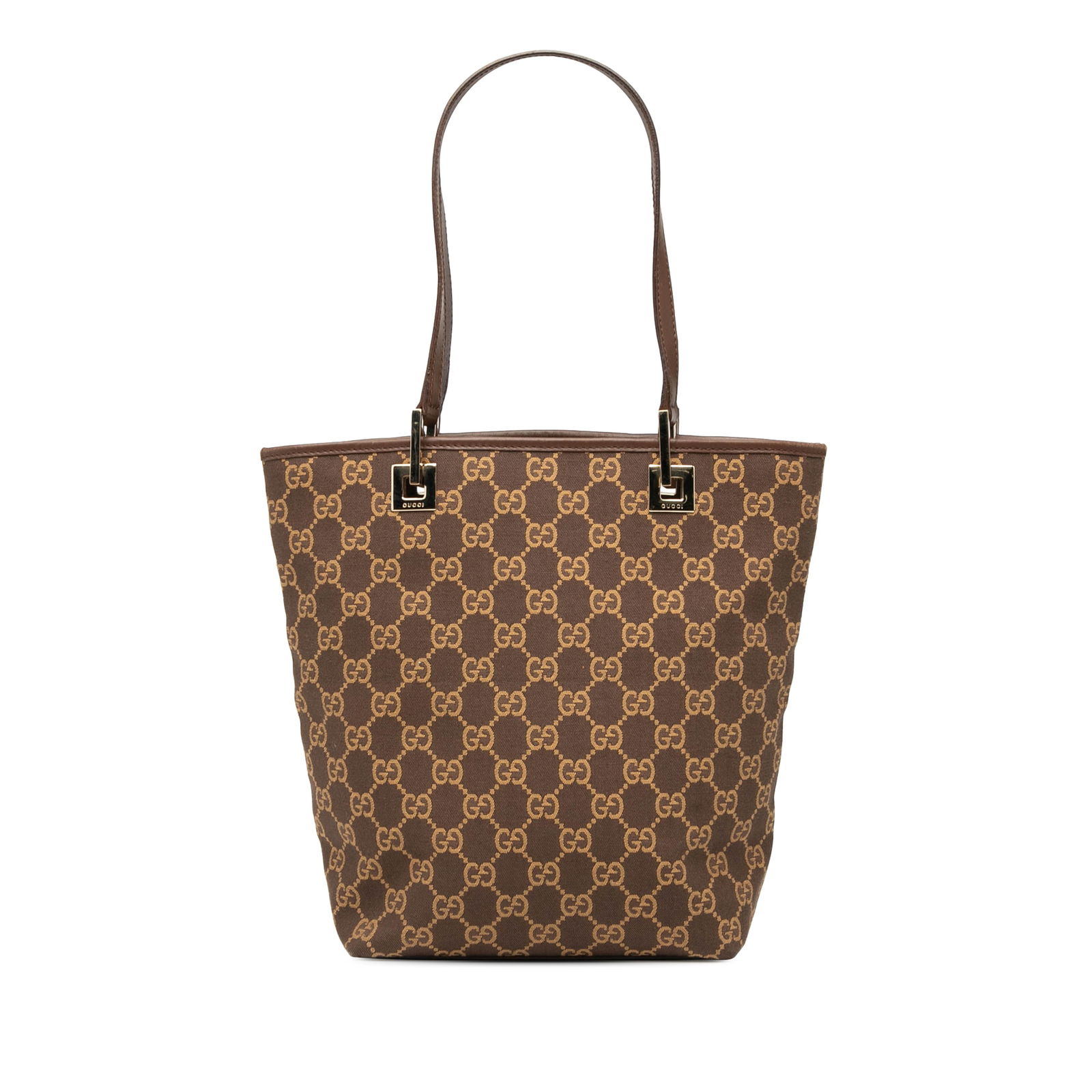 Brown GG Canvas Tote Bag with Leather Trim by Gucci: Brown GG Canvas Tote Bag with Leather Trim by Gucci This Gucci GG Canvas Tote features a brown canvas body with leather trim, flat leather handles, an open top, and an interior zip pocket. The bag sho