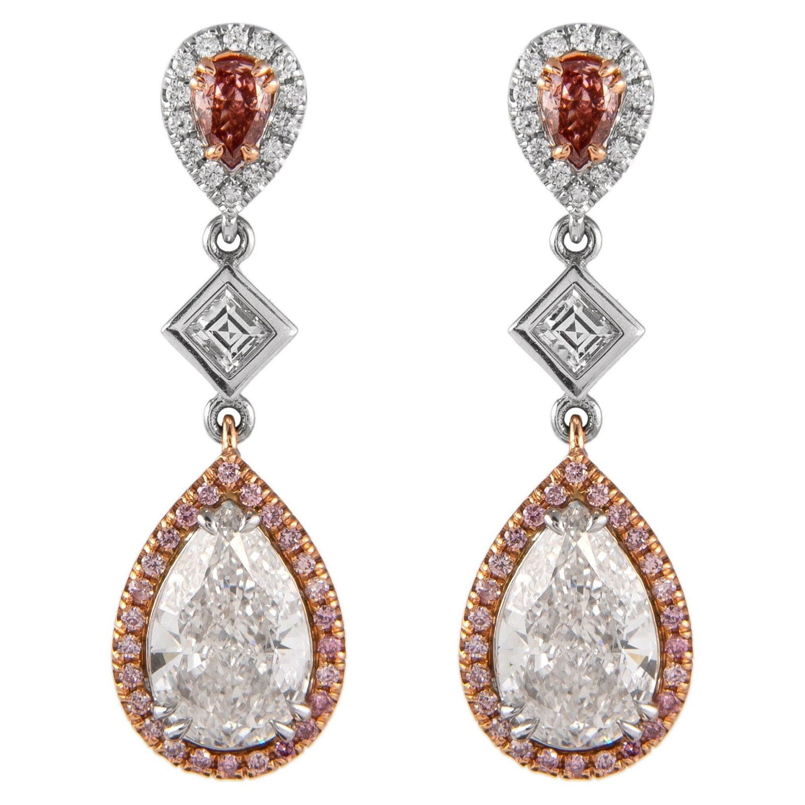 5.11ct GIA Pink Diamond Earrings 18k Gold: 5.11ct GIA Pink Diamond Earrings 18k Gold Make a stunning statement with these exceptional 5.11ct Pear & Fancy Intense Pink Diamond Earrings, meticulously crafted from 18k white and rose gold. These c