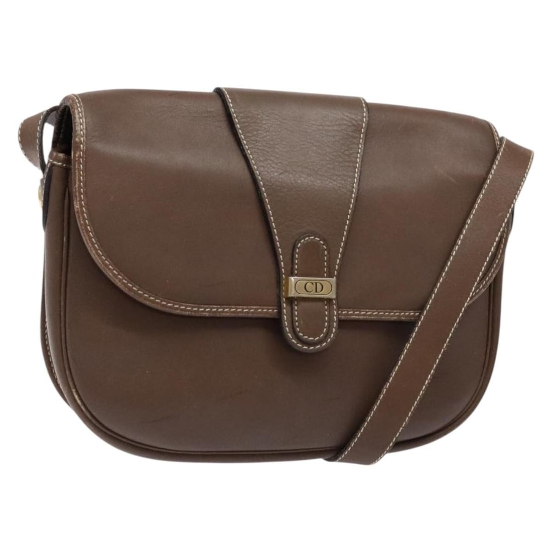 Vintage Christian Dior Brown Flap Shoulder Purse: Vintage Christian Dior Brown Flap Shoulder Purse This vintage Christian Dior CD flap shoulder bag features a brown exterior and is designed for female use. The bag shows signs of wear, including rubbi
