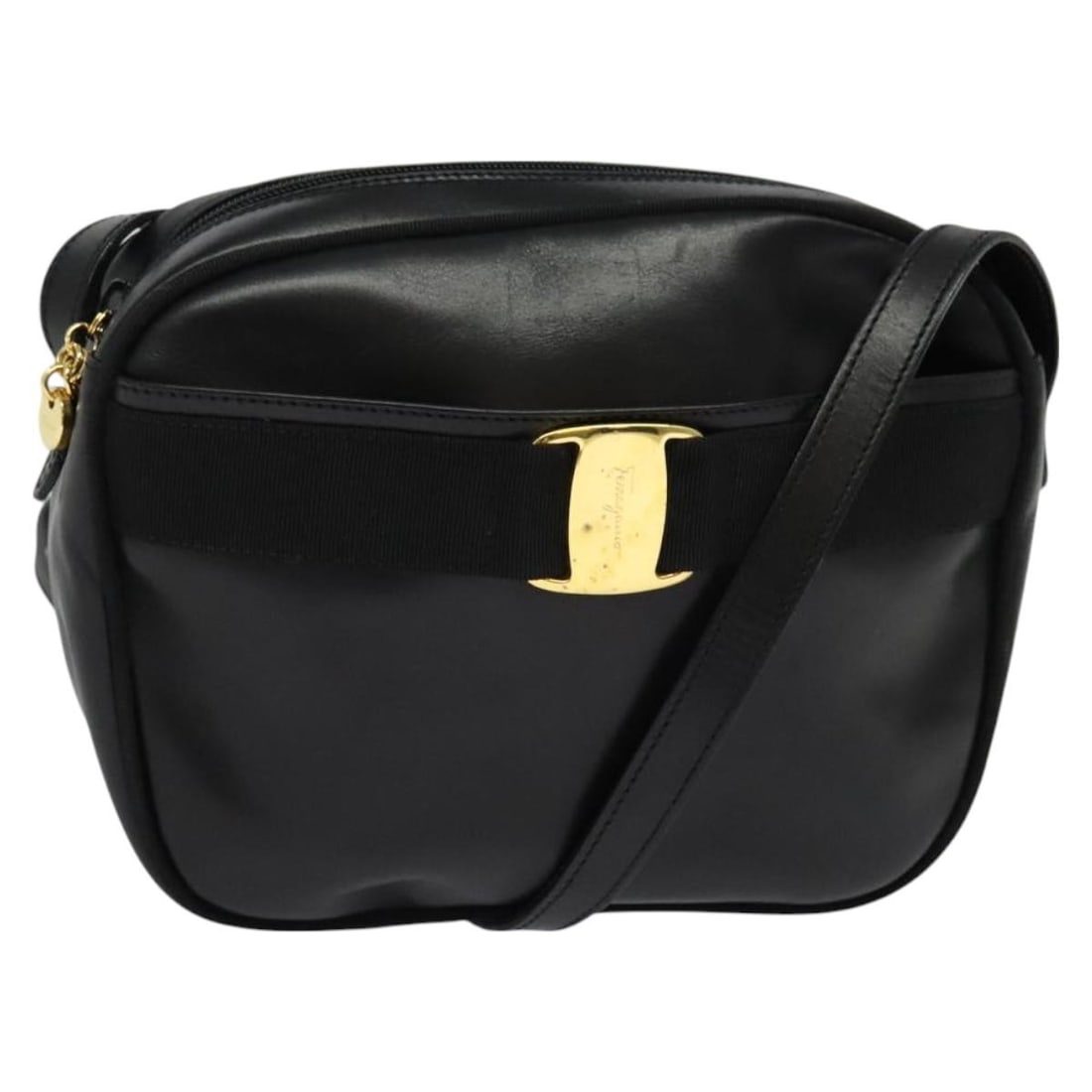 Vara Black Shoulder Bag by Salvatore Ferragamo: Vara Black Shoulder Bag by Salvatore Ferragamo This Salvatore Ferragamo Vala shoulder bag in black features a classic design with signs of use, including some loss of shape and rubbing on the exterior