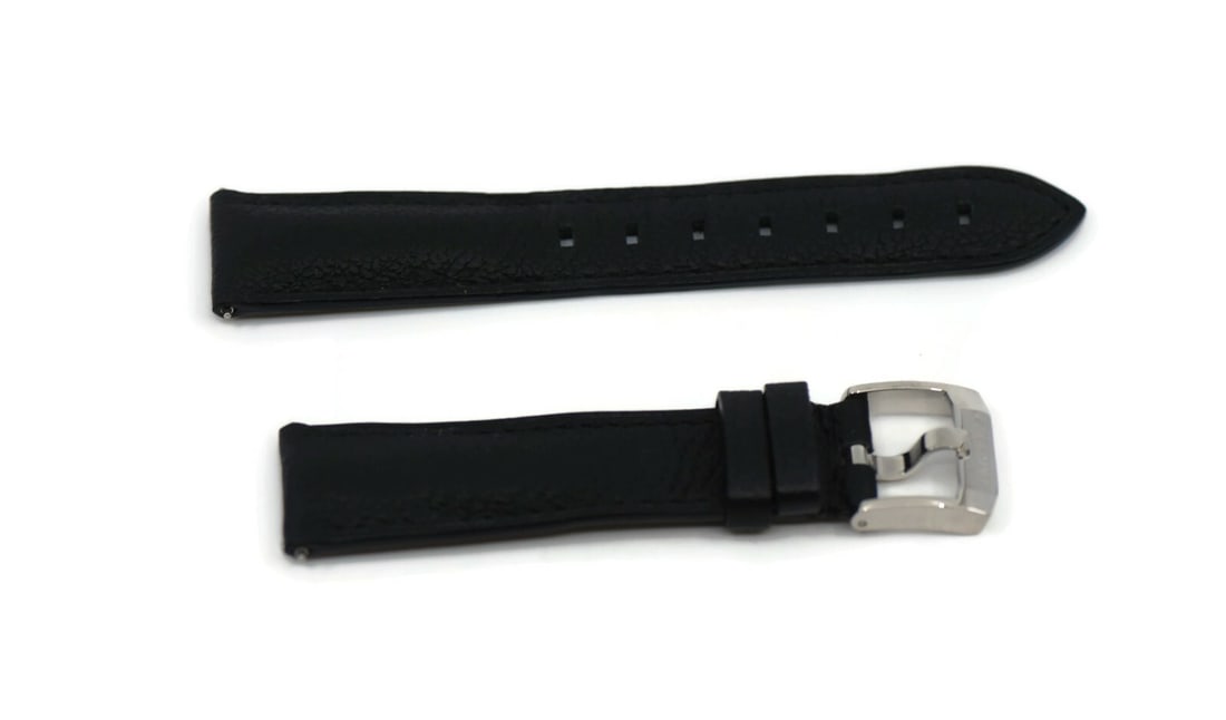 TAG Heuer Authentic Black Leather Wristwatch Band 18mm: TAG Heuer Authentic Black Leather Wristwatch Band 18mm This authentic Tag Heuer wristwatch band features a sleek black leather design, crafted for durability and style. With a width of 18 mm, this str