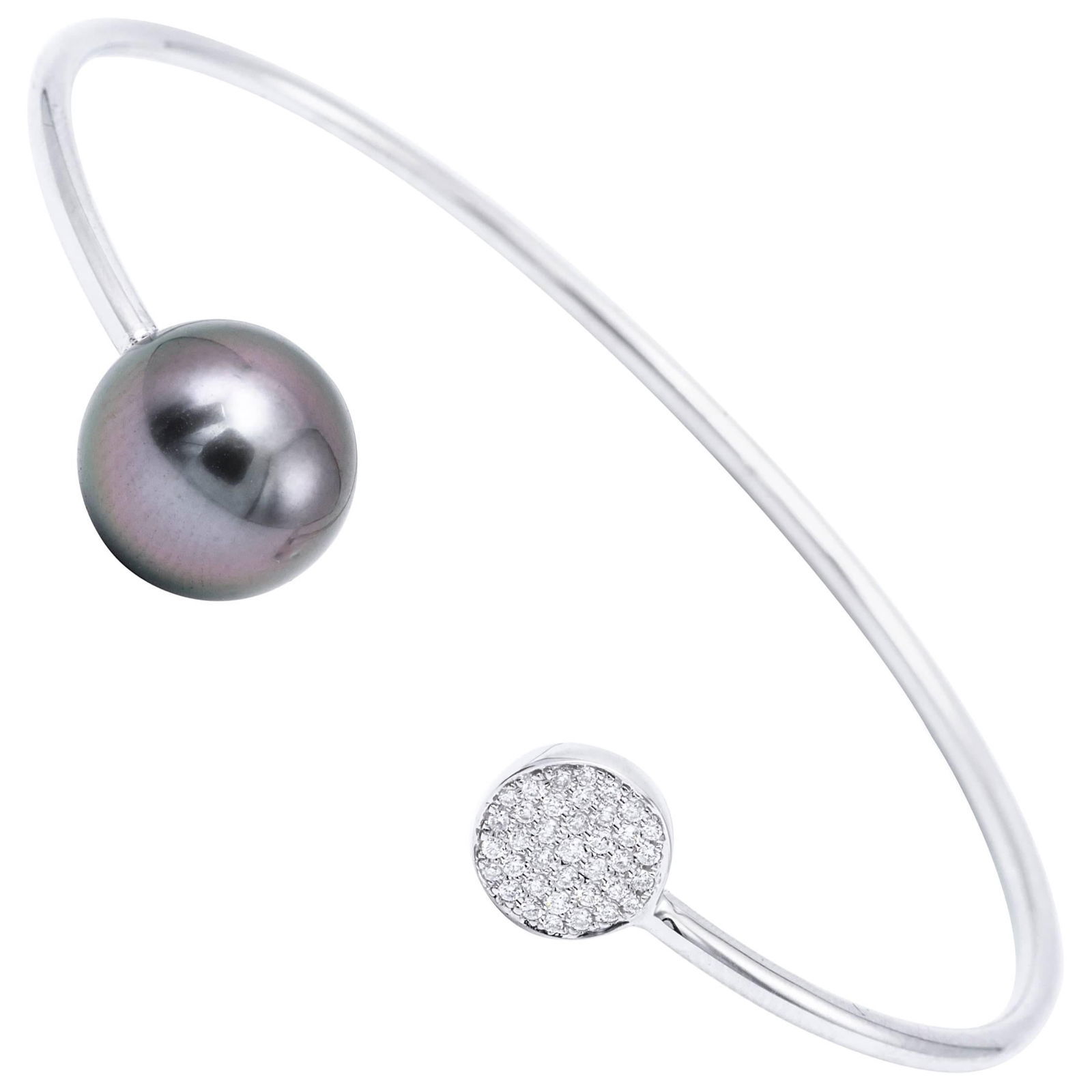 Harbor Diamonds 18K White Gold Tahitian Pearl Diamond Bangle 0.12CT: Harbor Diamonds 18K White Gold Tahitian Pearl Diamond Bangle 0.12CT This exquisite 18 Karat white gold bangle bracelet showcases a stunning grey Tahitian cultured pearl measuring 11-12 mm, complemente