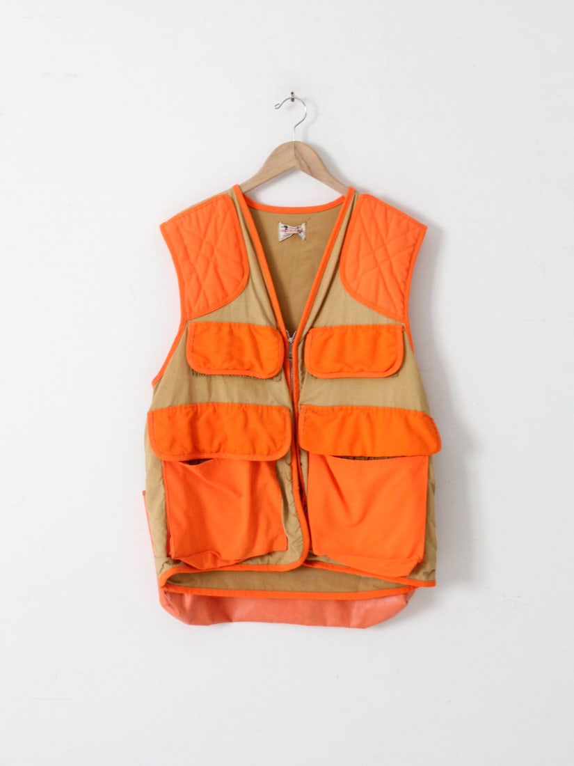 Vintage 1970s Canvasback Hunting Vest with Original Label: Vintage 1970s Canvasback Hunting Vest with Original Label Discover a classic piece of outdoor gear with this vintage 1970s-80s Canvasback hunting vest. Designed for durability and functionality, this