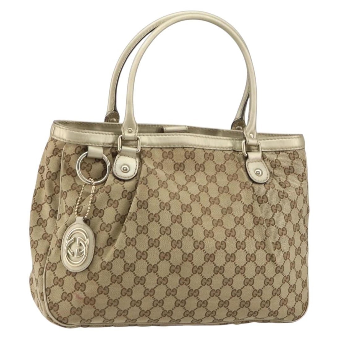 Gucci Sukey Beige Tote Bag with Top Handles: Gucci Sukey Beige Tote Bag with Top Handles This pre-owned Gucci Sukey Top Handle Tote is crafted in beige and designed for female use. It displays significant signs of wear, including surface rubbing