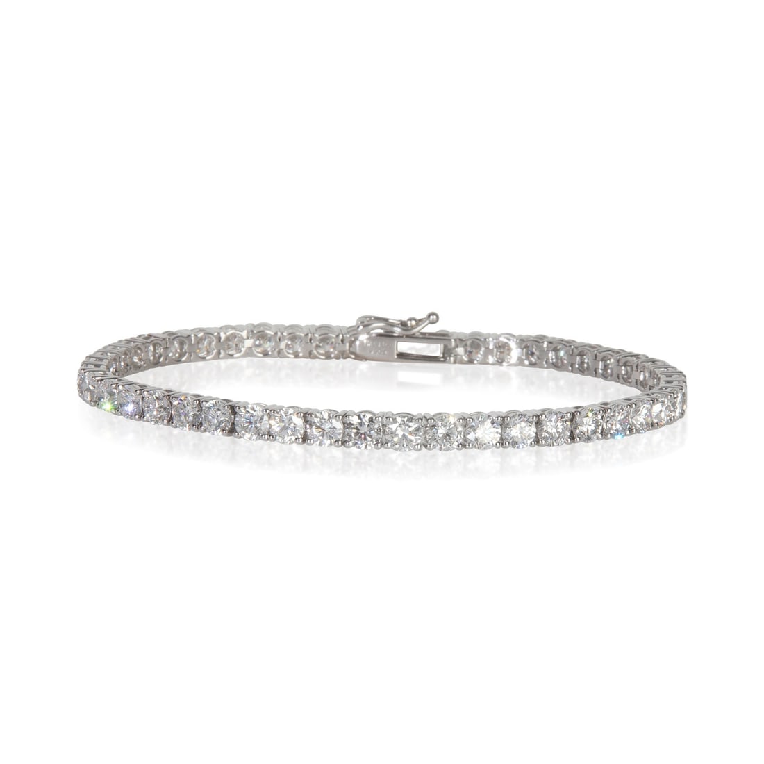 14K White Gold 9.5 ctw Lab-Grown Diamond Tennis Bracelet: 14K White Gold 9.5 ctw Lab-Grown Diamond Tennis Bracelet This stunning bracelet features 9.5 carats of sparkling round brilliant lab-grown diamonds set in luxurious 14K white gold. Measuring 7.25 inch
