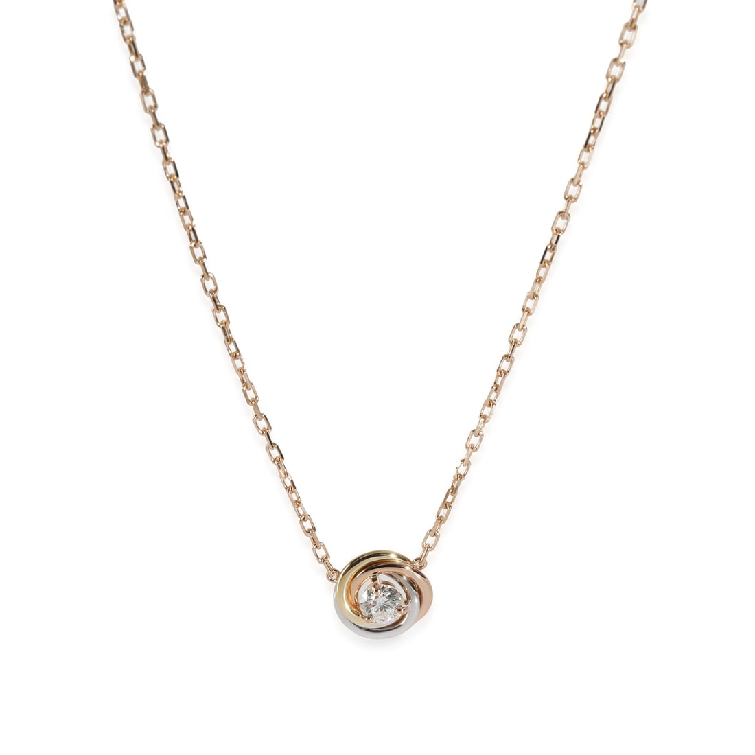 Trinity 18k Three Tone Gold Pendant with Single Diamond Accent: Trinity 18k Three Tone Gold Pendant with Single Diamond Accent This Cartier Trinity Pendant features a round brilliant-cut white diamond with a total weight of 0.17 carats and VS1 clarity. Crafted fro