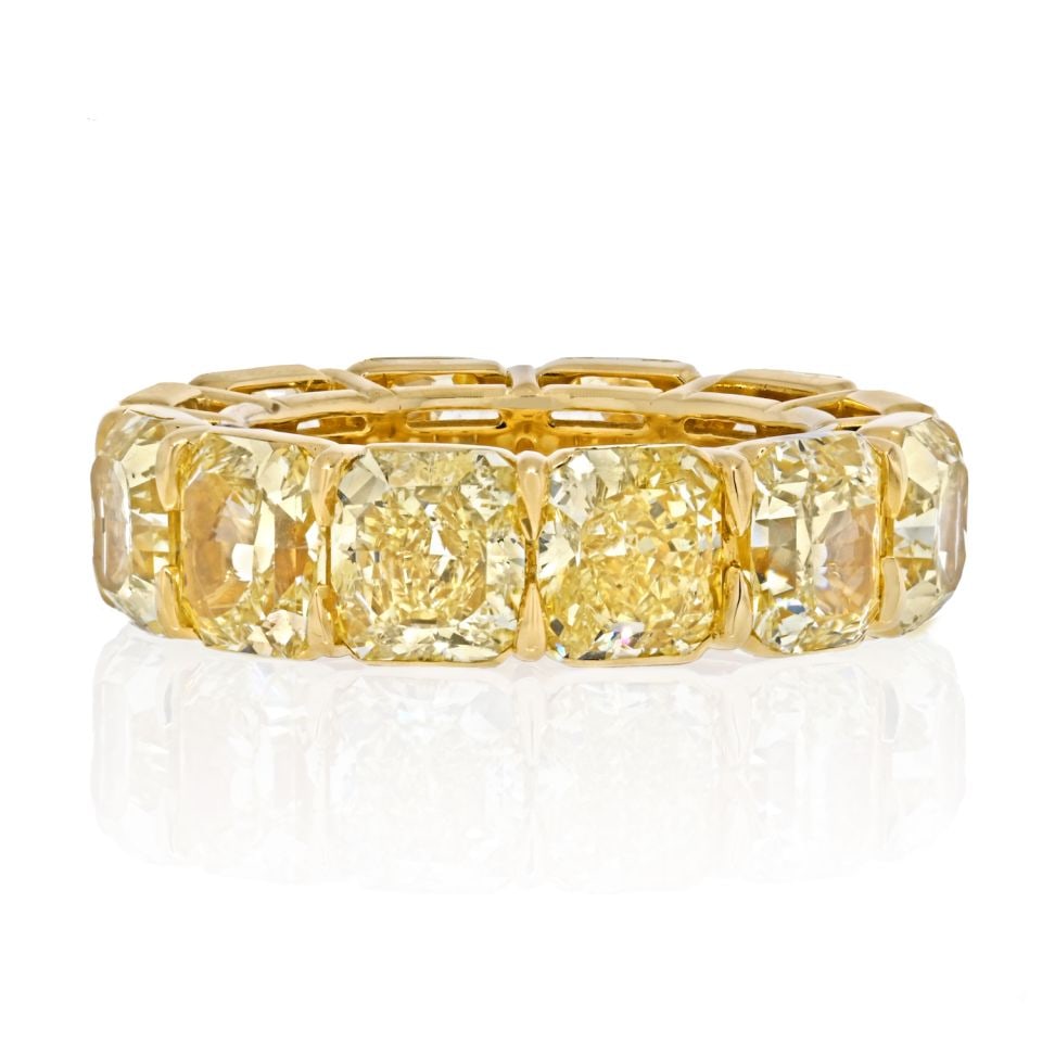 18K Yellow Gold Fancy Yellow Diamond Eternity Band with 12 GIA Certified Diamonds: 18K Yellow Gold Fancy Yellow Diamond Eternity Band with 12 GIA Certified Diamonds This exquisite eternity band showcases a stunning design featuring 12 GIA certified radiant cut fancy yellow diamonds,