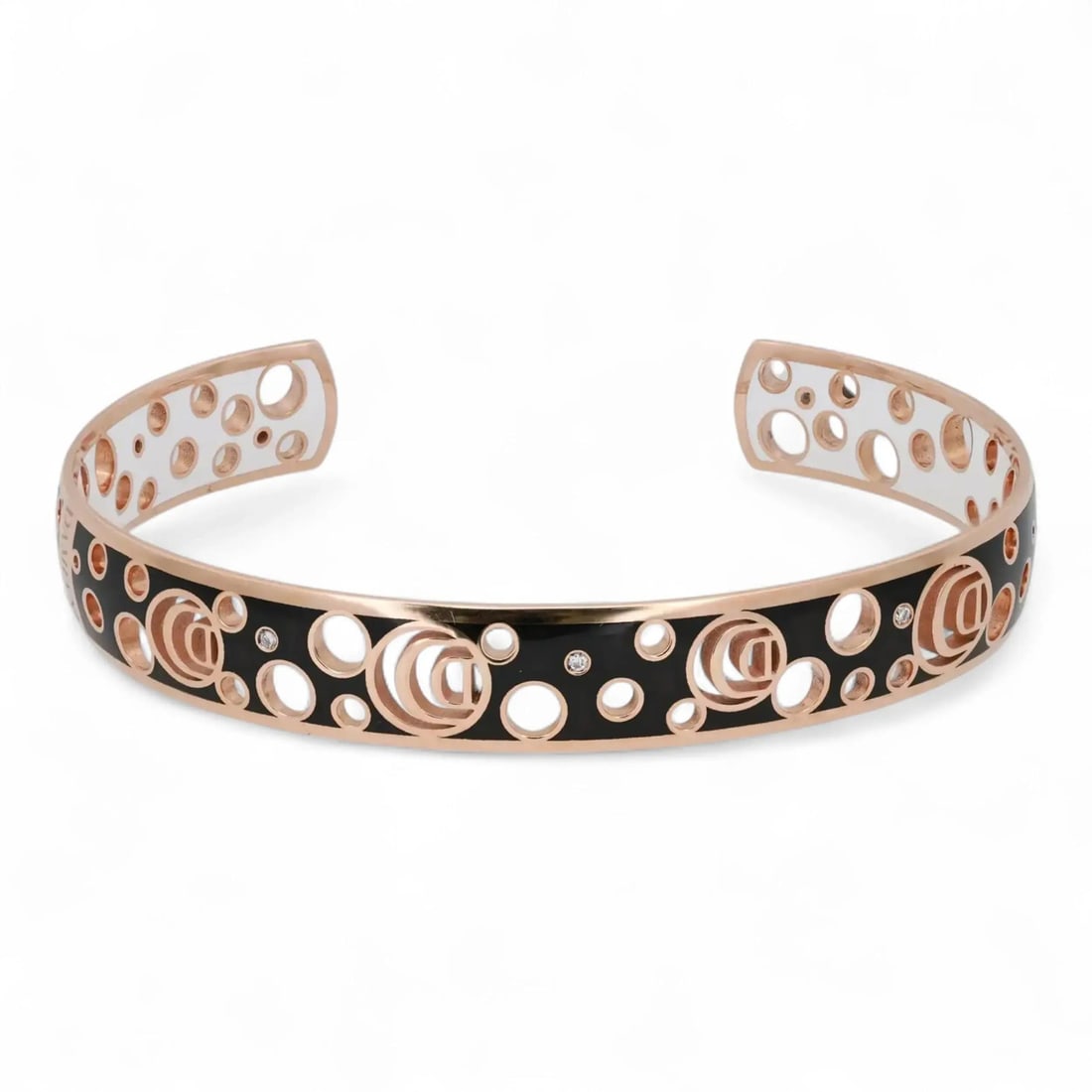 Damiani Damianissima Black Ceramic Diamond Bangle 18K Rose Gold: Damiani Damianissima Black Ceramic Diamond Bangle 18K Rose Gold This exquisite Damiani "Damianissima" bangle bracelet showcases a blend of elegance and modernity. Crafted in 18K rose gold, it features