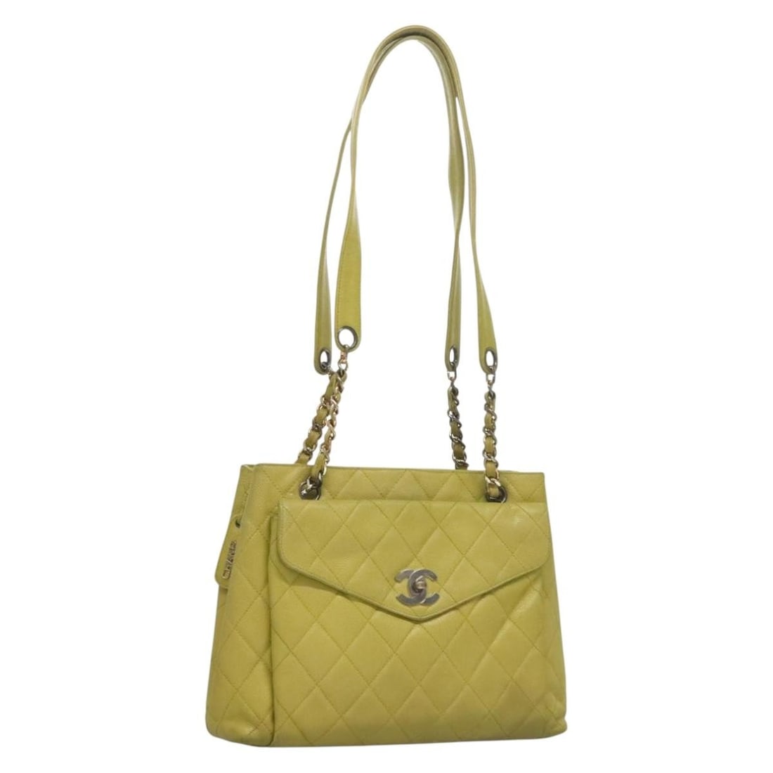Green Vintage Shoulder Bag with Front Pocket by Chanel: Green Vintage Shoulder Bag with Front Pocket by Chanel This Chanel vintage front pocket shoulder bag in green features a spacious design with a front pocket for added convenience. The bag shows signs