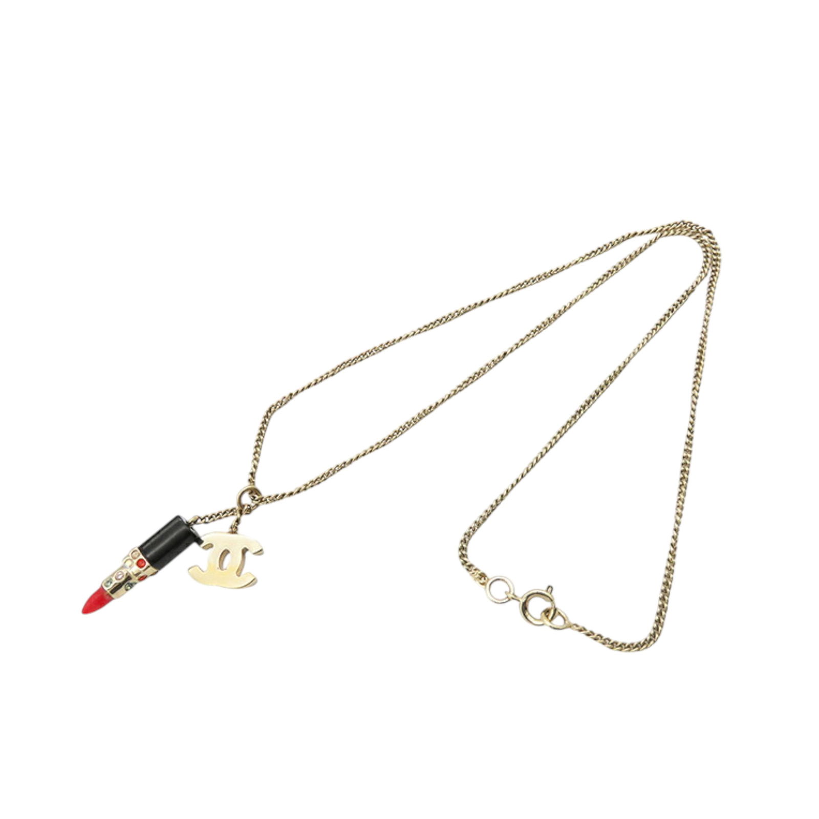 Chanel Gold Plated CC Lipstick Pendant Necklace Italy: Chanel Gold Plated CC Lipstick Pendant Necklace Italy Elevate your accessory collection with this Chanel Gold Plated CC Lipstick Pendant Necklace. This stunning piece features a gold-tone pendant craf