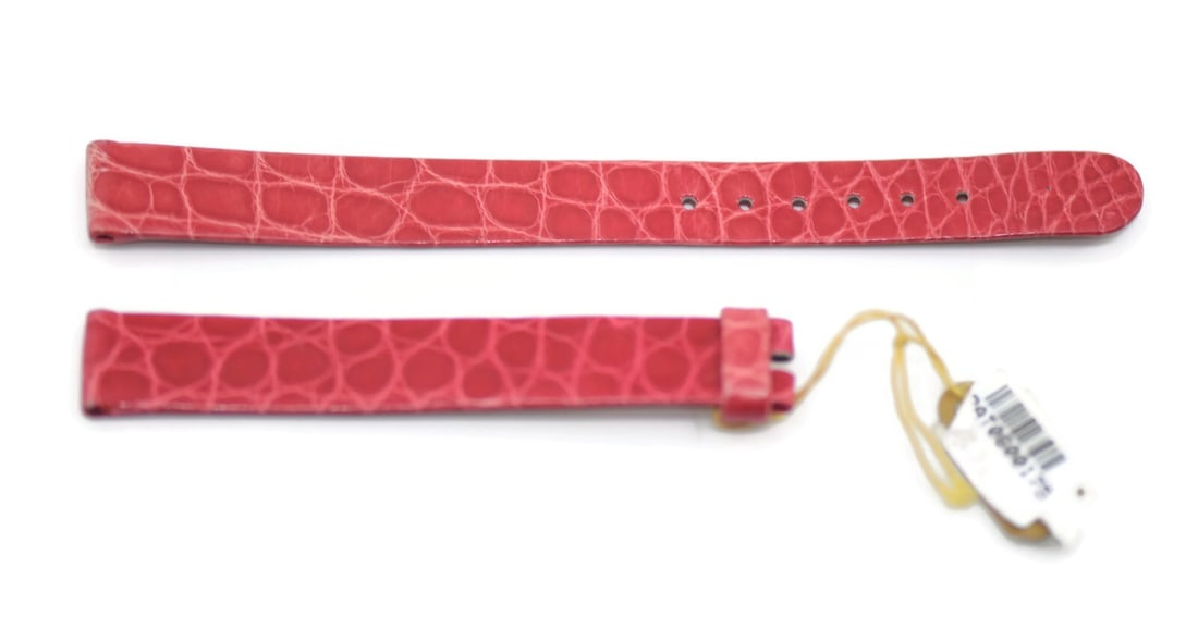 Patek Philippe Authentic Red Leather 12mm Two-Piece Watch Strap: Patek Philippe Authentic Red Leather 12mm Two-Piece Watch Strap Discover the elegance of this Patek Philippe Red Leather Strap, designed specifically for wristwatches. This two-piece strap features a