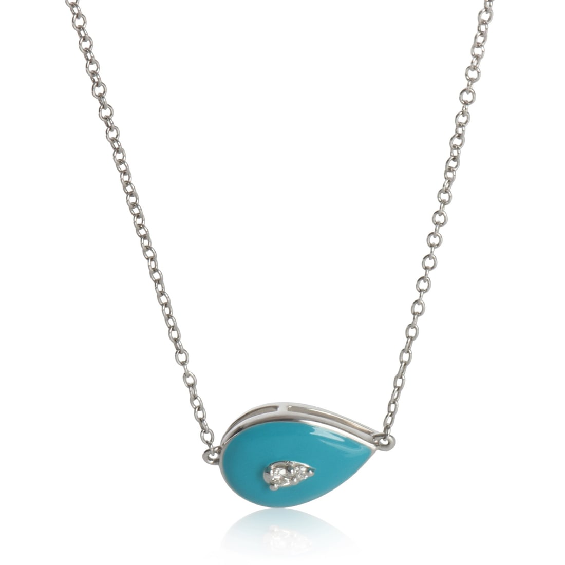 14K White Gold Diamond Teal Enamel Round Pendant: 14K White Gold Diamond Teal Enamel Round Pendant This exquisite pendant features a round brilliant diamond set in luxurious 14K white gold, showcasing a beautiful teal enamel design. The pendant is de