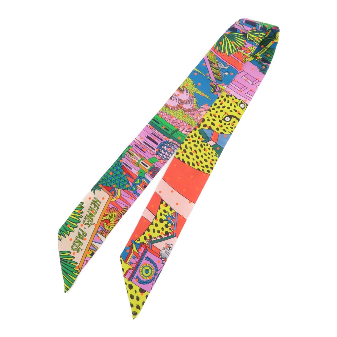 HERMES Multicolor Silk Twilly Scarf Made in France: HERMES Multicolor Silk Twilly Scarf Made in France Elevate your accessory collection with this stunning HERMES Twilly Scarf. Crafted from luxurious silk, this multicolor scarf showcases a vibrant desi