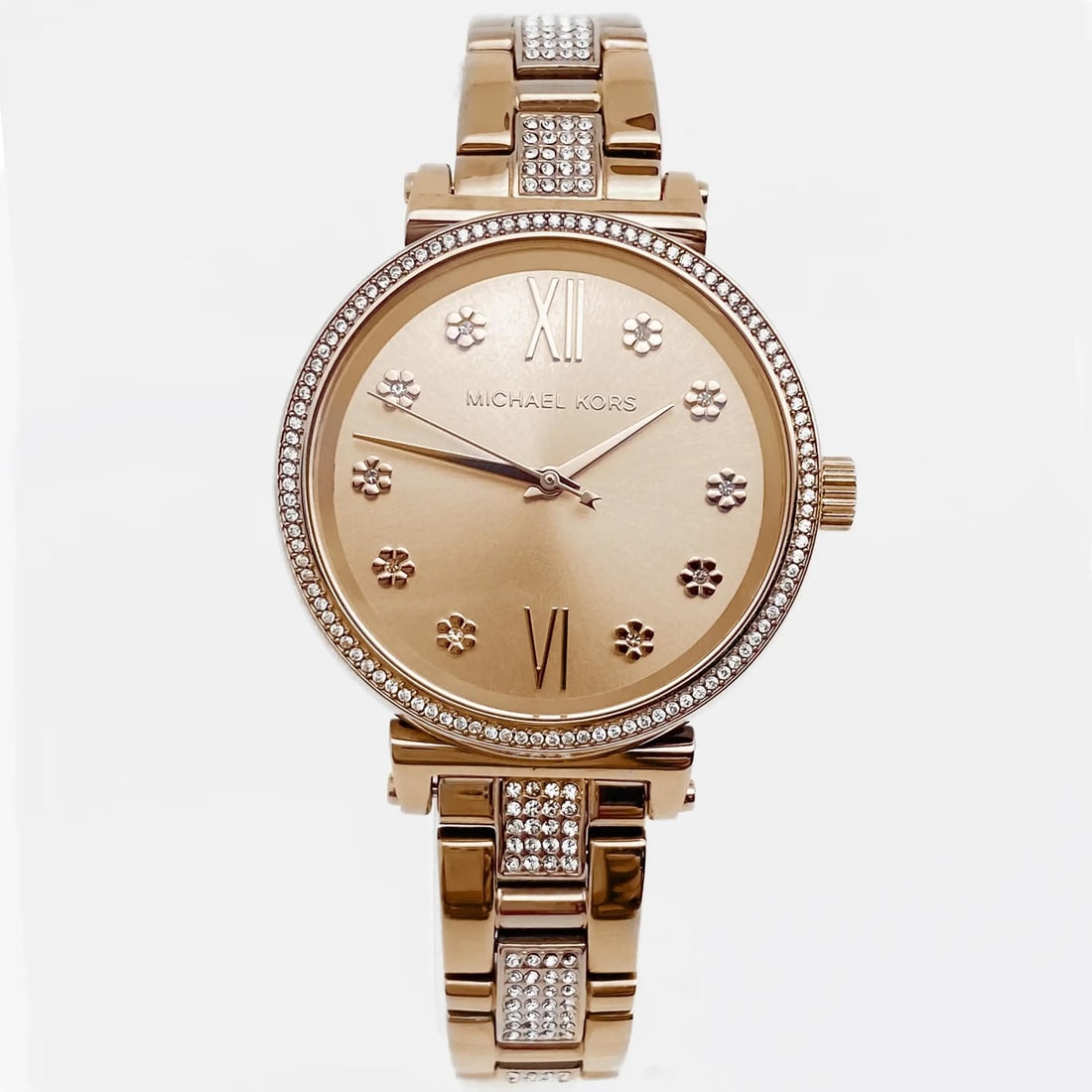 Michael Kors Sofie 36mm Pink Gold Quartz Watch MK3882 with Gem-Set Bezel: Michael Kors Sofie 36mm Pink Gold Quartz Watch MK3882 with Gem-Set Bezel This Michael Kors Sofie 36mm watch combines elegance and functionality. Featuring a stunning floral pink dial with a sunburst p