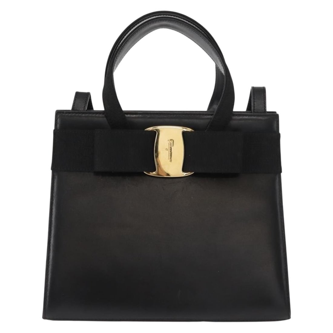 Vara Bow Convertible Tote by Salvatore Ferragamo in Black: Vara Bow Convertible Tote by Salvatore Ferragamo in Black This pre-owned Salvatore Ferragamo Convertible Vara Bow Tote in black is a handbag designed for women. It shows visible signs of use, includin