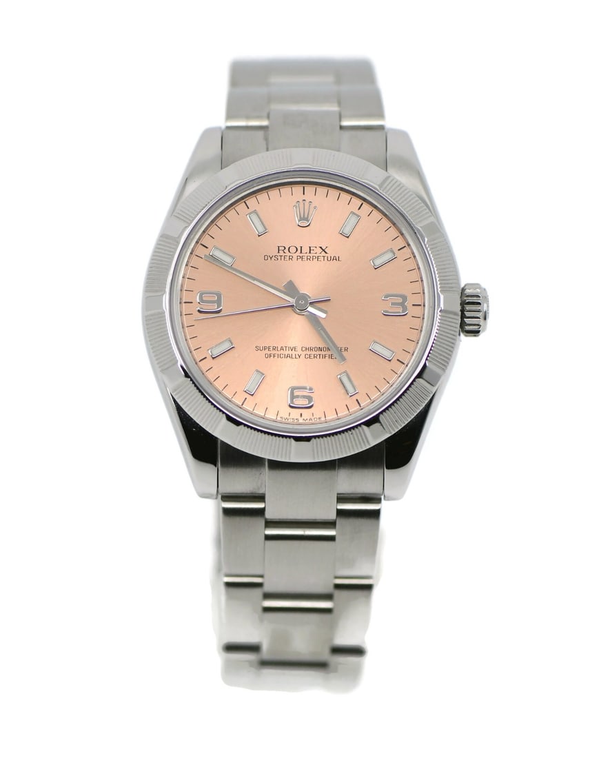 Rolex Oyster Perpetual 31mm Pink Dial Stainless Steel Ref 177210 Wristwatch: Rolex Oyster Perpetual 31mm Pink Dial Stainless Steel Ref 177210 Wristwatch This pre-owned Rolex Oyster Perpetual 31 wristwatch features a 31 mm round stainless steel case and matching stainless steel