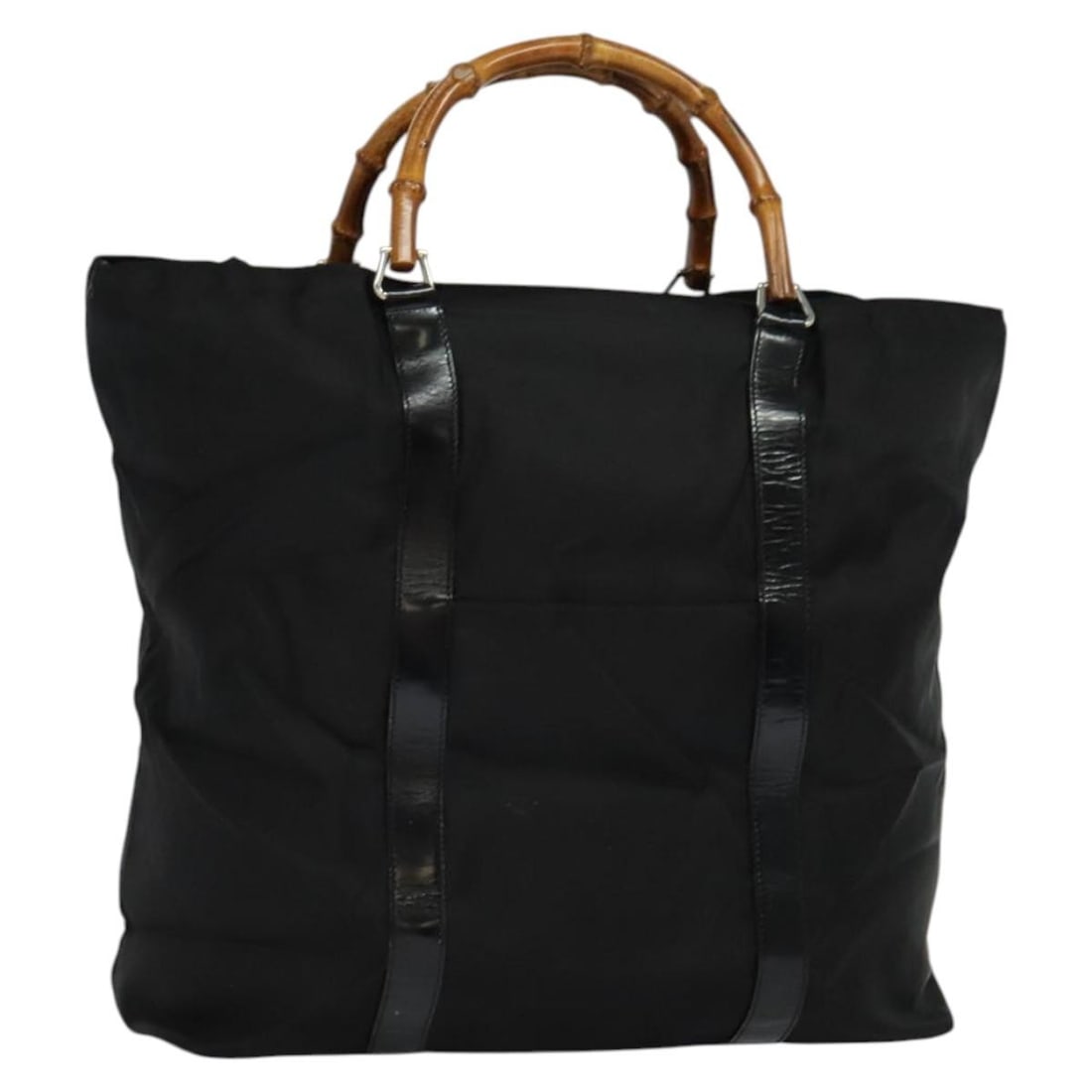Black Bamboo Handle Tote Bag by Gucci Vintage Collection: Black Bamboo Handle Tote Bag by Gucci Vintage Collection This is a Gucci vintage bamboo handle tote bag in black, designed for women. The exterior shows signs of use including some rubbing, loss of sh