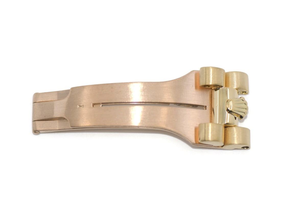 Rolex Day Date 18K Yellow Gold Buckle Ref 8385 Authentic: Rolex Day Date 18K Yellow Gold Buckle Ref 8385 Authentic This exquisite Rolex Day Date buckle is crafted from luxurious 18K yellow gold, designed for the Rolex model 8385. With a width of 16mm and a w