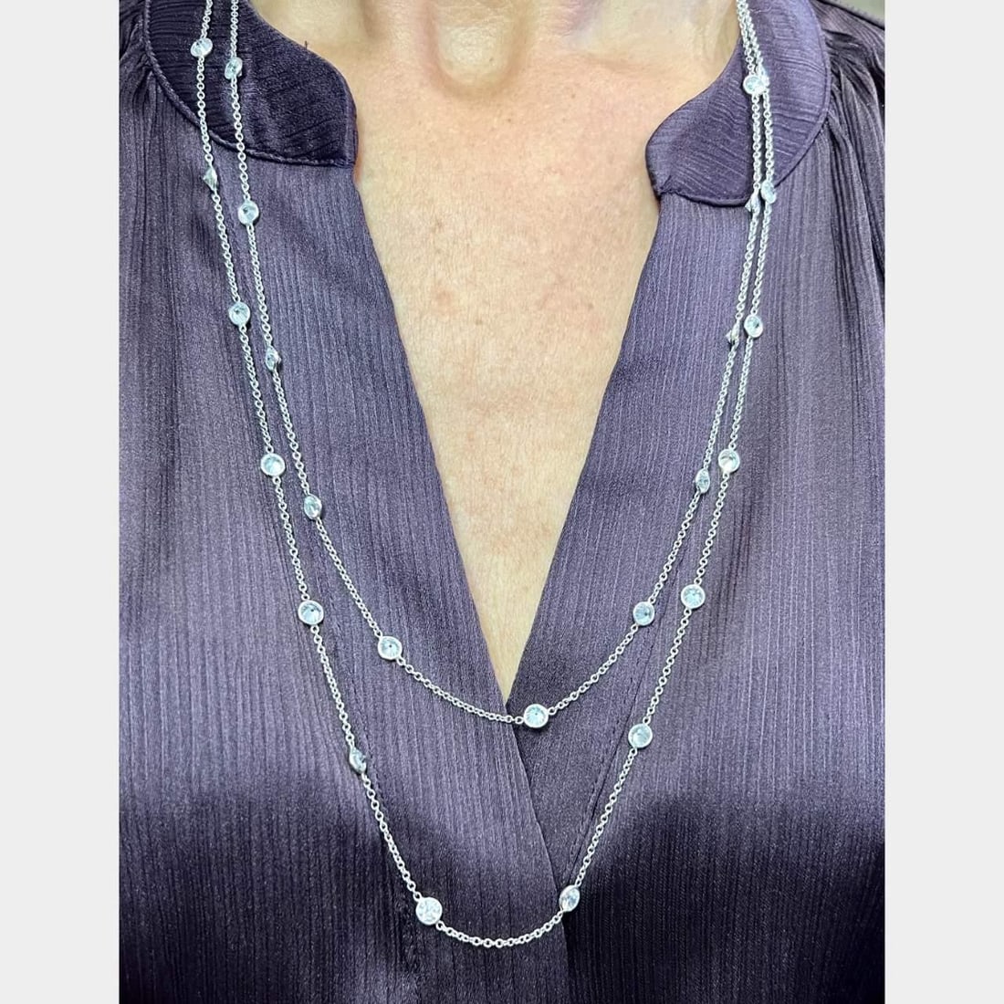 Platinum 15.00 Ct Diamond by the Yard Necklace 52 Inches: Platinum 15.00 Ct Diamond by the Yard Necklace 52 Inches This exquisite Platinum Diamond by the Yard Necklace features a stunning total diamond weight of approximately 15.00 Ct, showcasing 40 diamonds