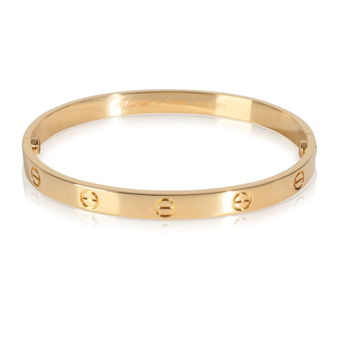 Love Collection 18k Yellow Gold Bracelet with Box and Papers by Cartier: Love Collection 18k Yellow Gold Bracelet with Box and Papers by Cartier This Cartier Love bracelet is crafted from 18k yellow gold and features the iconic screw motif design. The bracelet measures 19