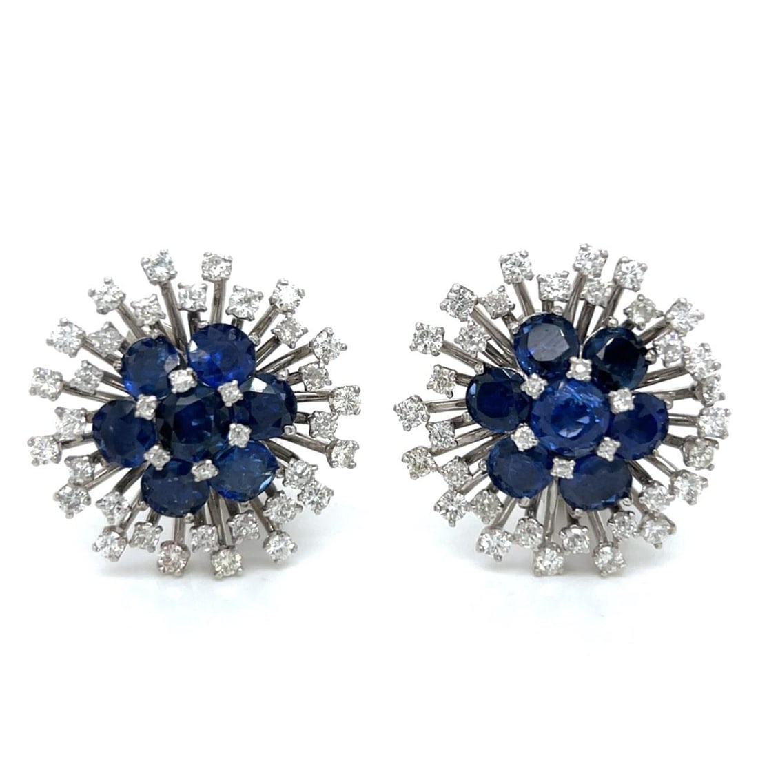 Art Deco Platinum Earrings with 14 Sapphires and 76 Diamonds: Art Deco Platinum Earrings with 14 Sapphires and 76 Diamonds These exquisite Art Deco earrings are crafted from platinum and feature a stunning combination of sapphires and Old Mine diamonds. The earr