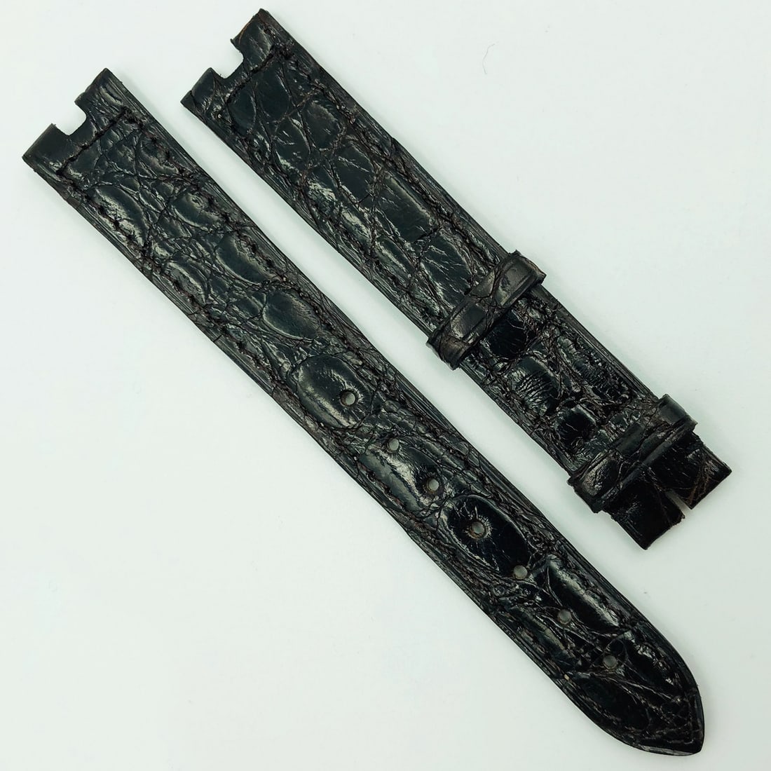 Cartier Authentic Dark Brown Leather Wristwatch Strap 16mm 580OH10ODCA: Cartier Authentic Dark Brown Leather Wristwatch Strap 16mm 580OH10ODCA This authentic Cartier 16mm dark brown leather strap is designed for use with a buckle. Crafted with precision, this wristwatch b