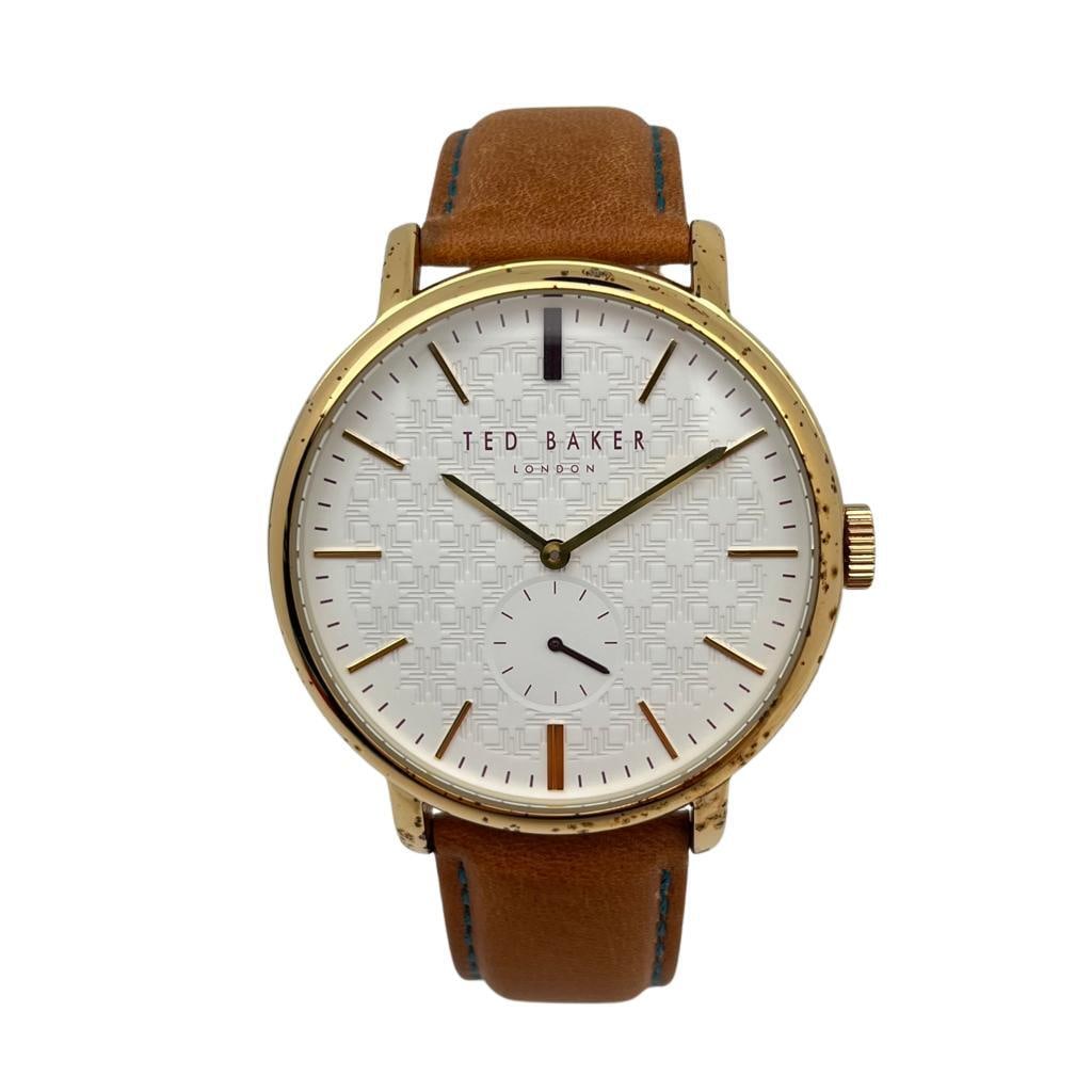 Ted Baker London Gold-Tone Quartz Men's Watch TE15193011 with White Dial: Ted Baker London Gold-Tone Quartz Men's Watch TE15193011 with White Dial Elevate your timepiece collection with the Ted Baker London Gold-Tone Steel White Dial Quartz Men's Watch TE15193011. This styl