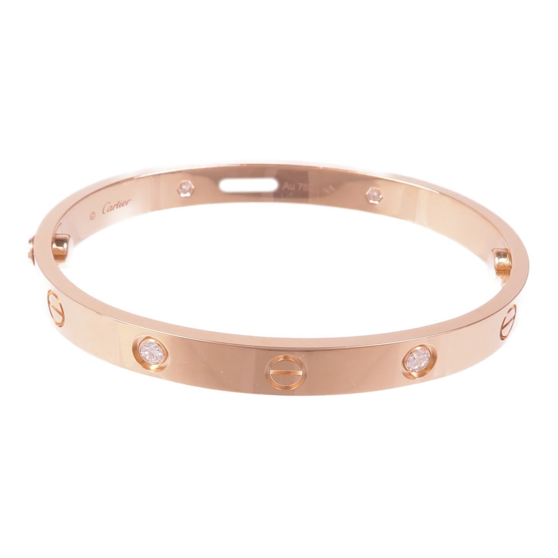 CARTIER 4 Diamond Love Bracelet in 18K Rose Gold: CARTIER 4 Diamond Love Bracelet in 18K Rose Gold This exquisite Cartier Love Bracelet is crafted from 18K rose gold, featuring four stunning diamonds that enhance its luxurious appeal. The bracelet is