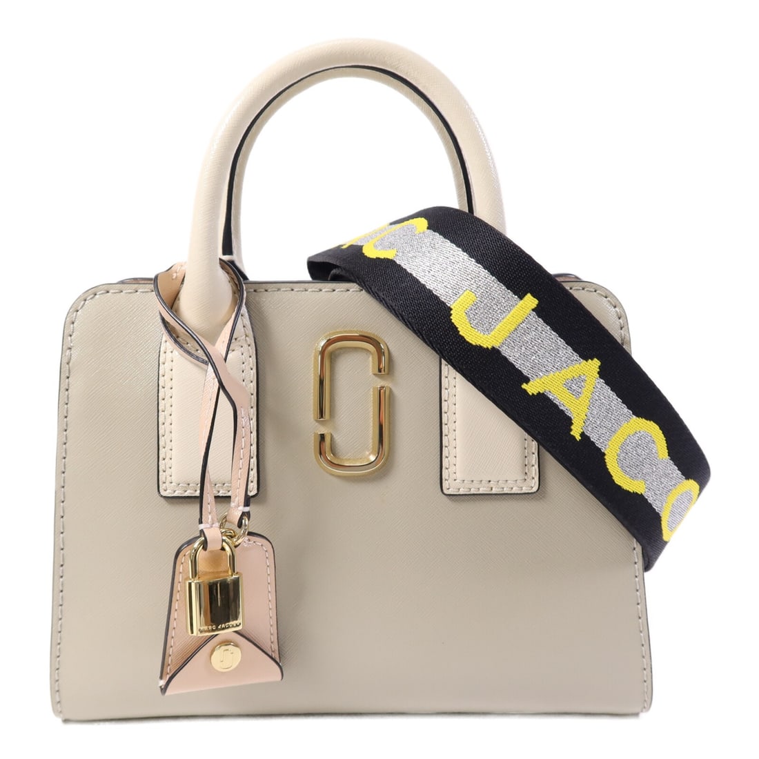 MARC JACOBS Little Big Shot 2 Way Shoulder Bag Calfskin Beige: MARC JACOBS Little Big Shot 2 Way Shoulder Bag Calfskin Beige Elevate your style with the MARC JACOBS Little Big Shot Bag, a versatile 2-way shoulder bag crafted from luxurious calfskin. This chic bei