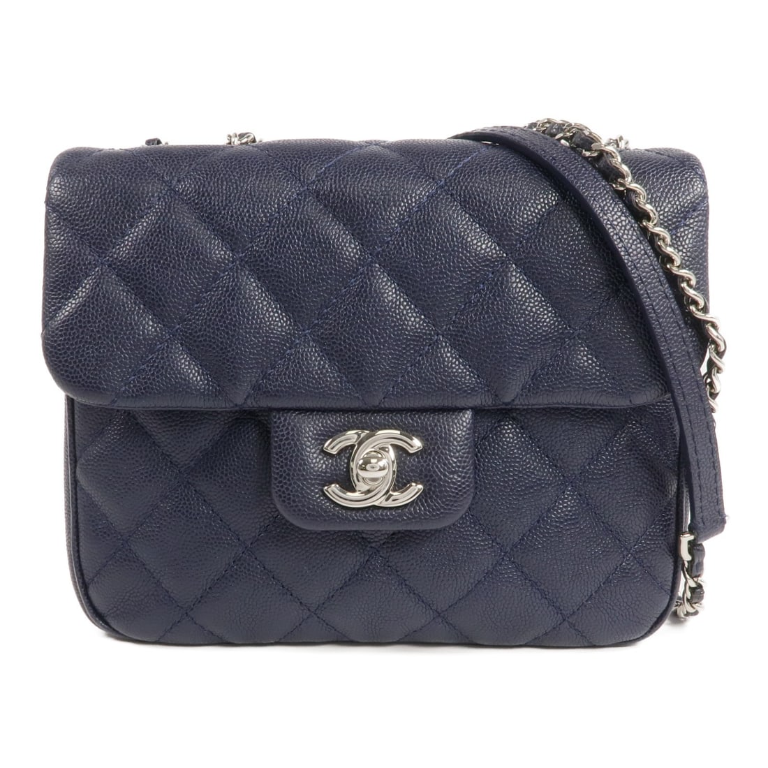 Navy Calfskin Leather CHANEL Shoulder Bag with Silver Tone CC Chain: Navy Calfskin Leather CHANEL Shoulder Bag with Silver Tone CC Chain This CHANEL shoulder bag features luxurious calfskin leather in a sophisticated navy color. Designed with a classic CC logo and silv