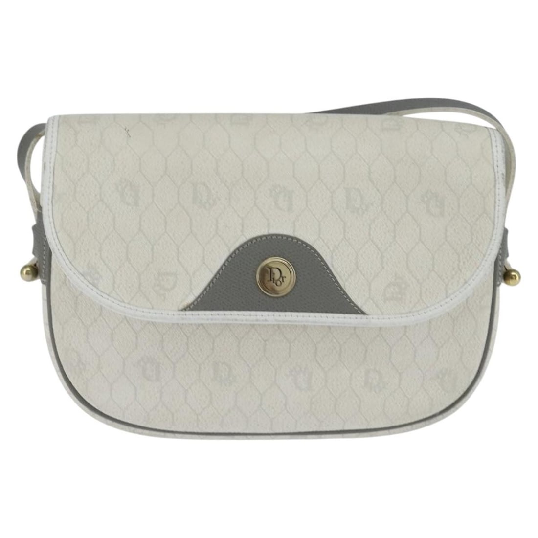 Vintage Dior Shoulder Purse with Honeycomb Pattern in White Leather: Vintage Dior Shoulder Purse with Honeycomb Pattern in White Leather This pre-owned Christian Dior vintage Honeycomb flap crossbody bag features a white exterior with leather detailing. The bag is desi