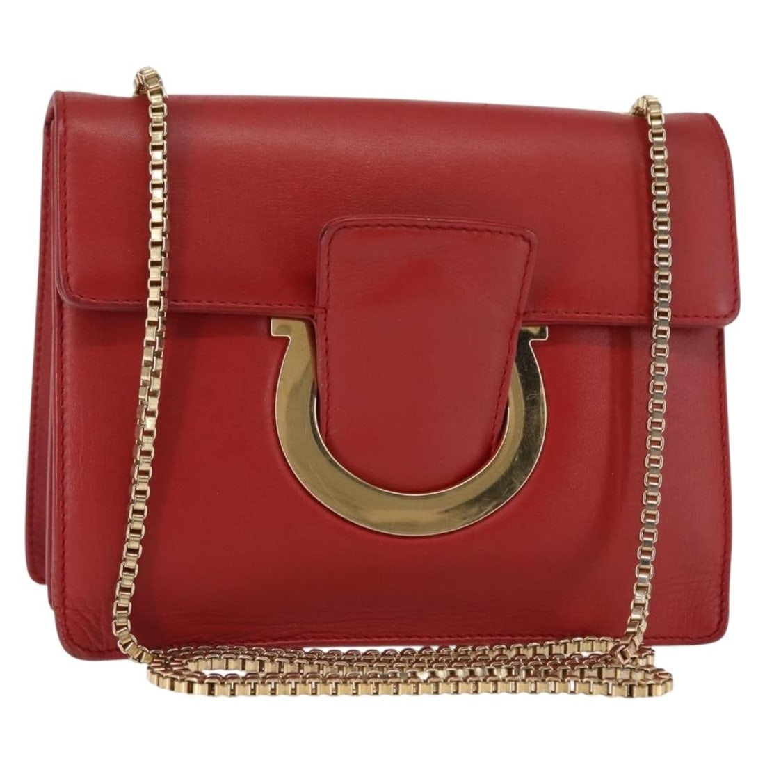 Red Thalia Shoulder Bag by Salvatore Ferragamo: Red Thalia Shoulder Bag by Salvatore Ferragamo This Salvatore Ferragamo Thalia shoulder bag in red is a pre-owned item in good condition. It features minor signs of use, including light rubbing and st