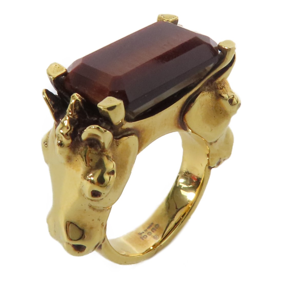 GUCCI GG Ring Brown Metal US Size 5.25: GUCCI GG Ring Brown Metal US Size 5.25 This exquisite GUCCI ring features a unique design crafted from a distinctive metal with a beautiful brown finish. Designed in Italy, this ring is a size 5.25 an