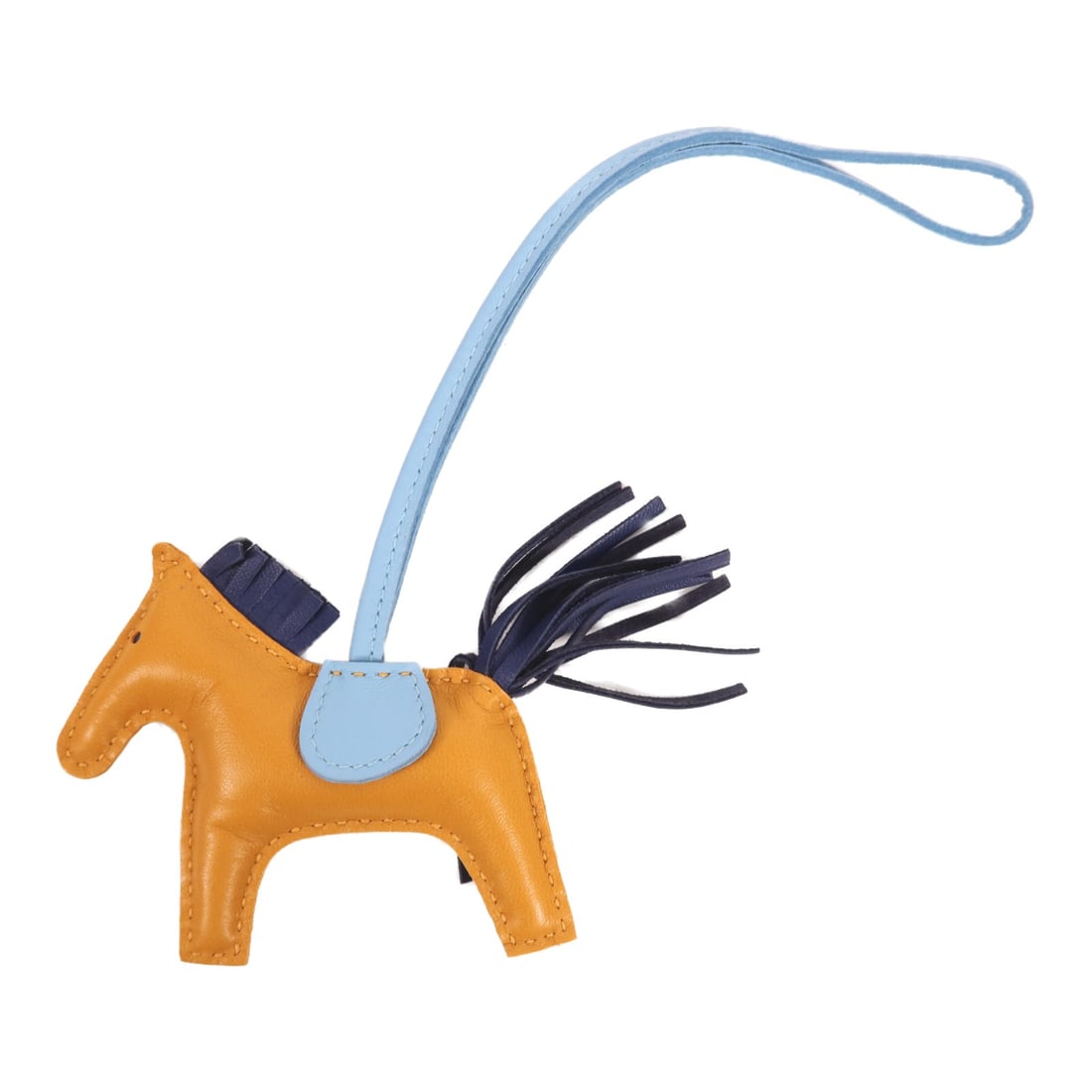 HERMES Rodeo PM Charm Brown Blue Navy Lambskin: HERMES Rodeo PM Charm Brown Blue Navy Lambskin Introducing the HERMES Rodeo PM Charm, a stylish accessory crafted from premium lambskin leather. This exquisite charm features a beautiful combination o