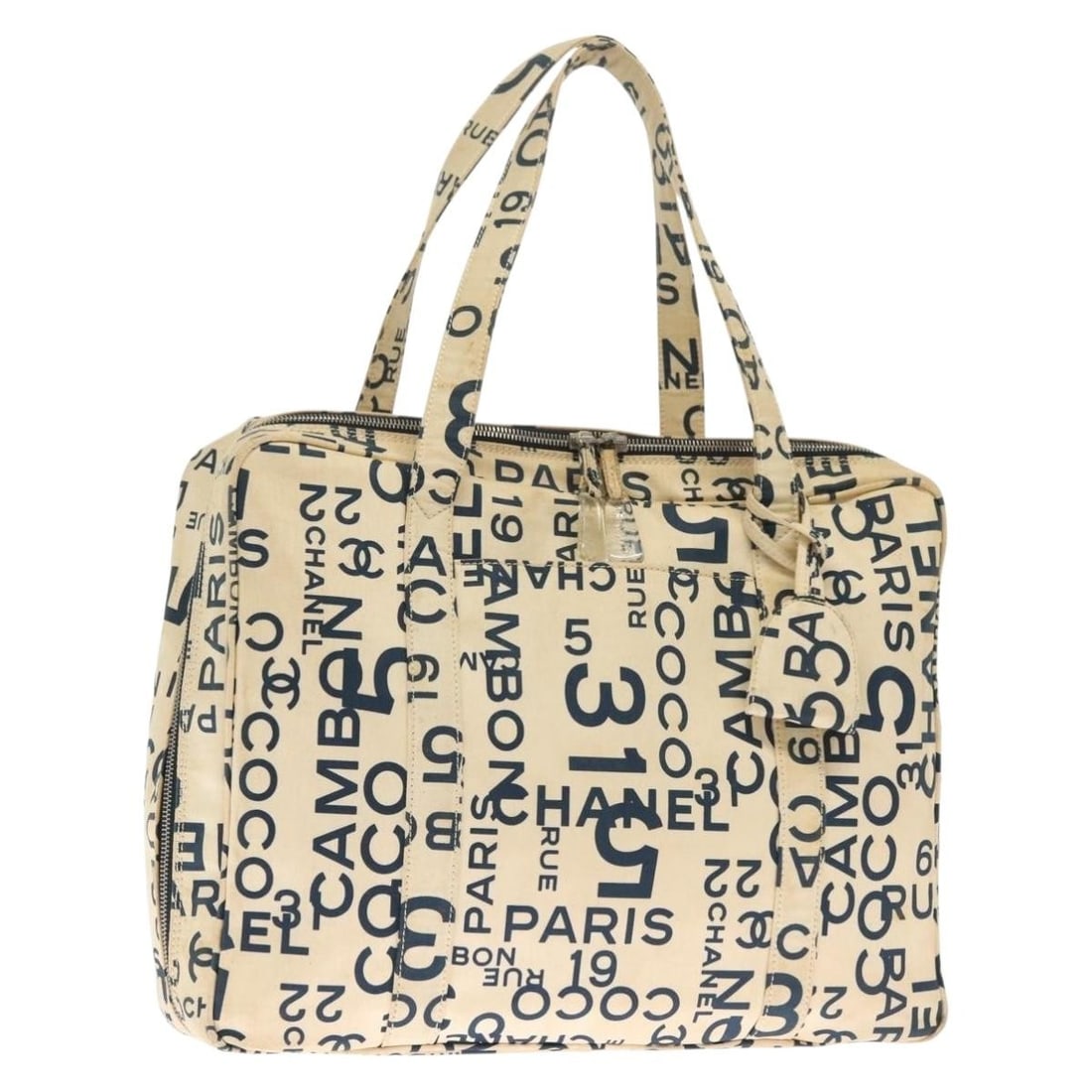 Cambon Tote Bag in White Leather by Chanel: Cambon Tote Bag in White Leather by Chanel This pre-owned Chanel Cambon tote bag features a white exterior and is designed for female use. The bag is in good condition with signs of use, including som